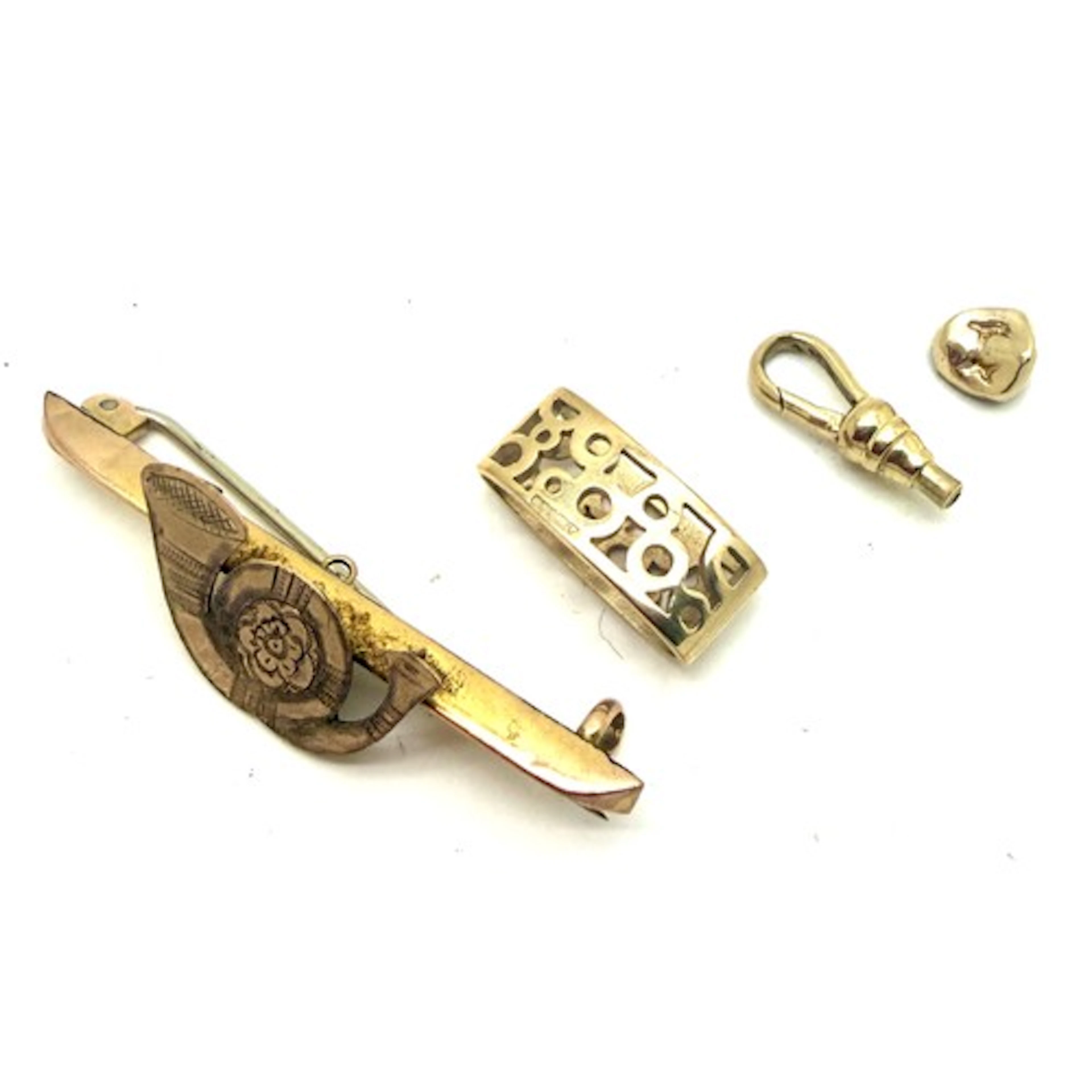 Nine carat gold to include brooch, clip, etc. Total weight 5...