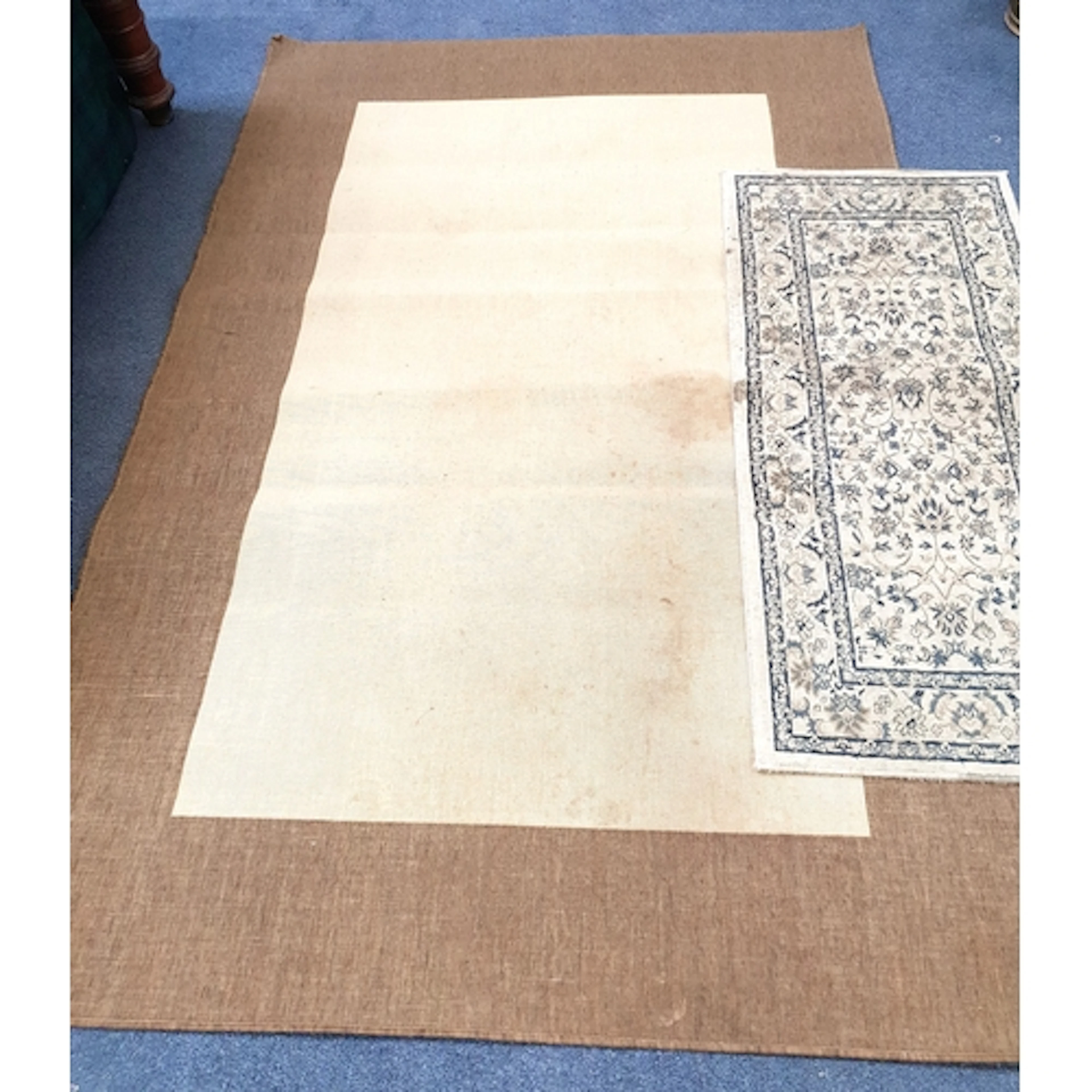TWO FLOOR RUGS the smaller runner style example in shades of...