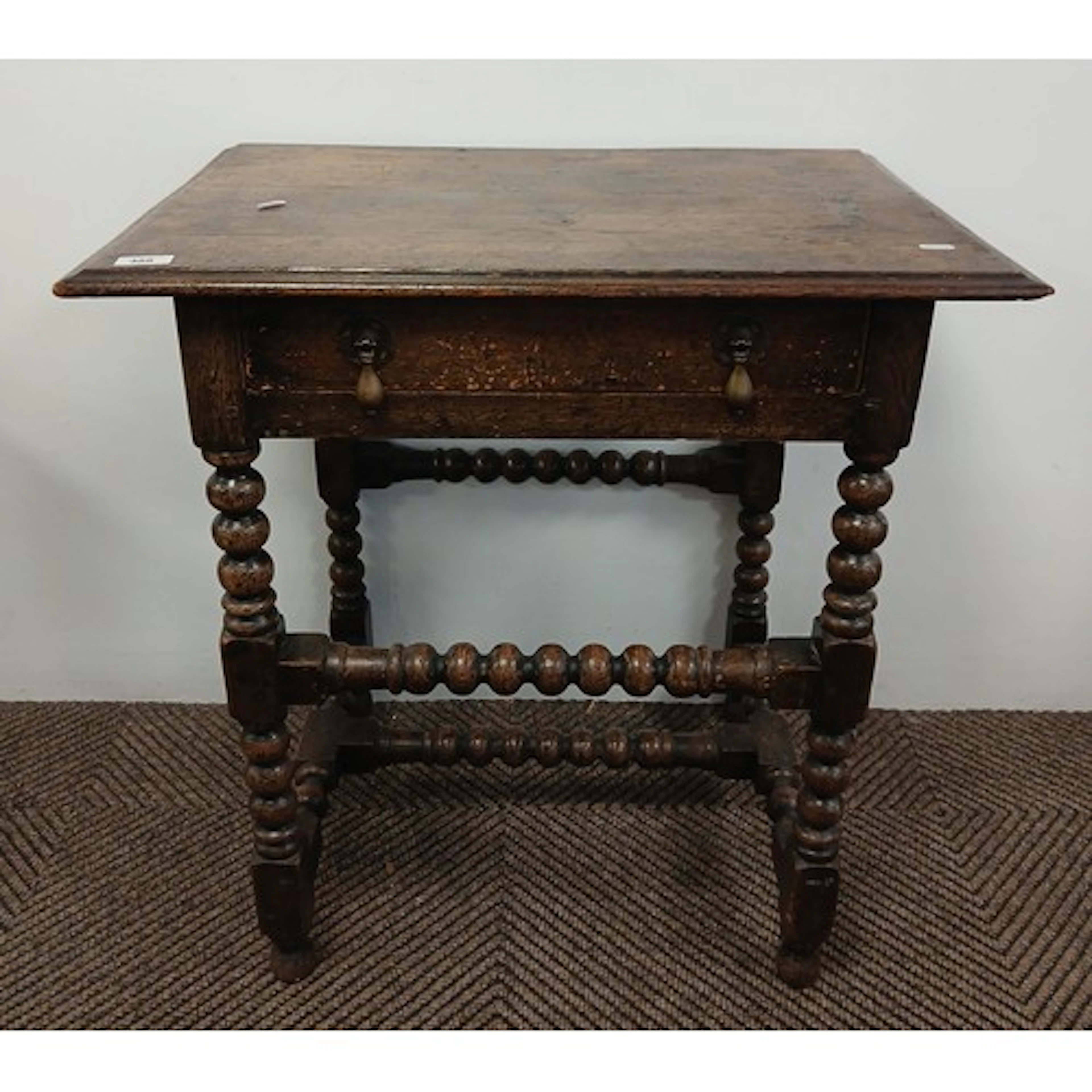 Antique oak side table, fitted frieze drawer, raised on bobb...