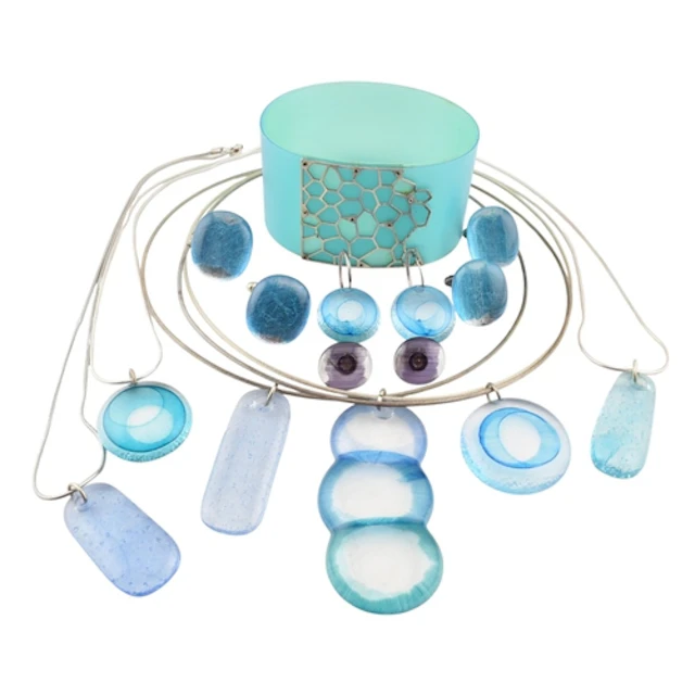 Collection of artisanal silver, white metal and glass jewell...