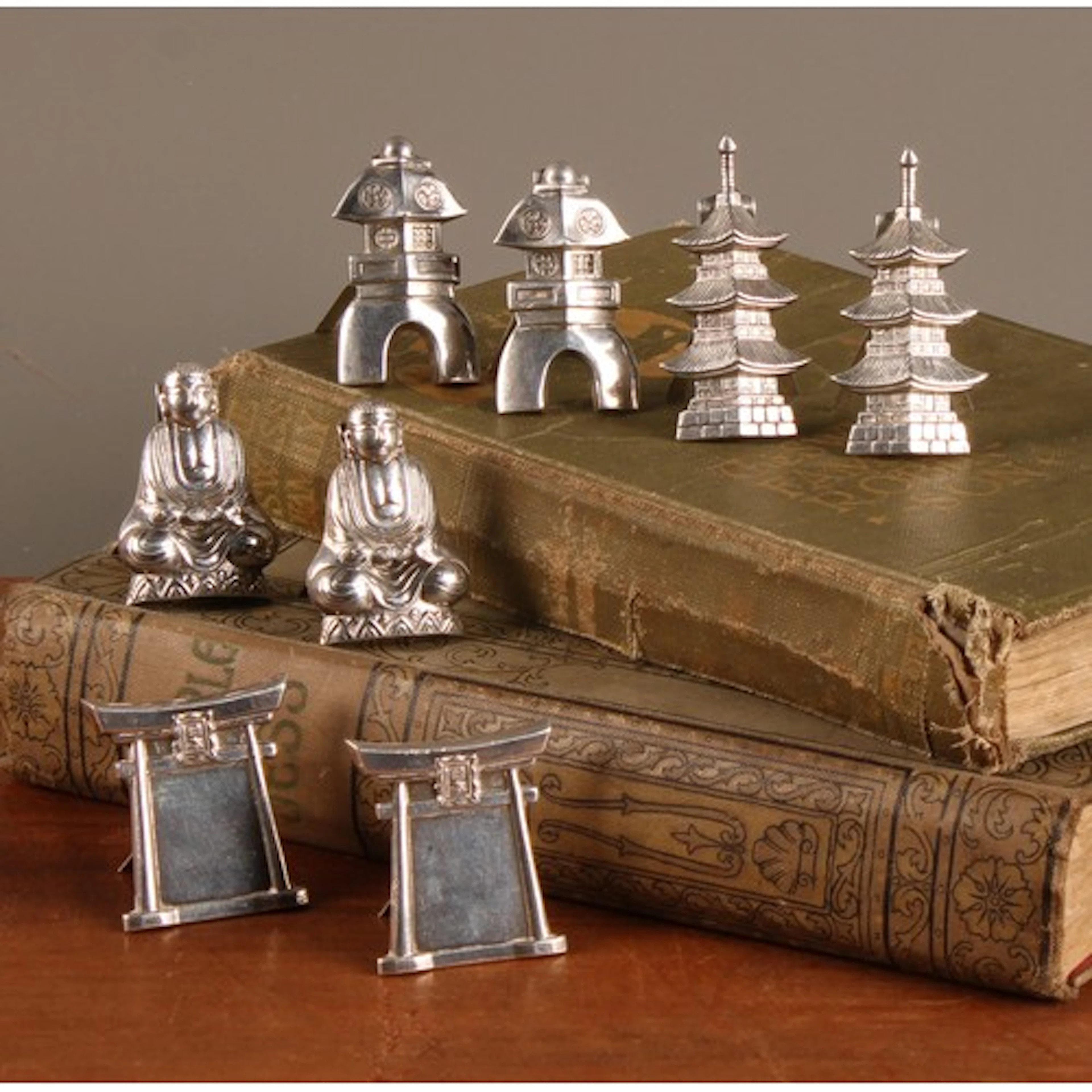 A set of eight Japanese silver novelty menu holders, in pair...