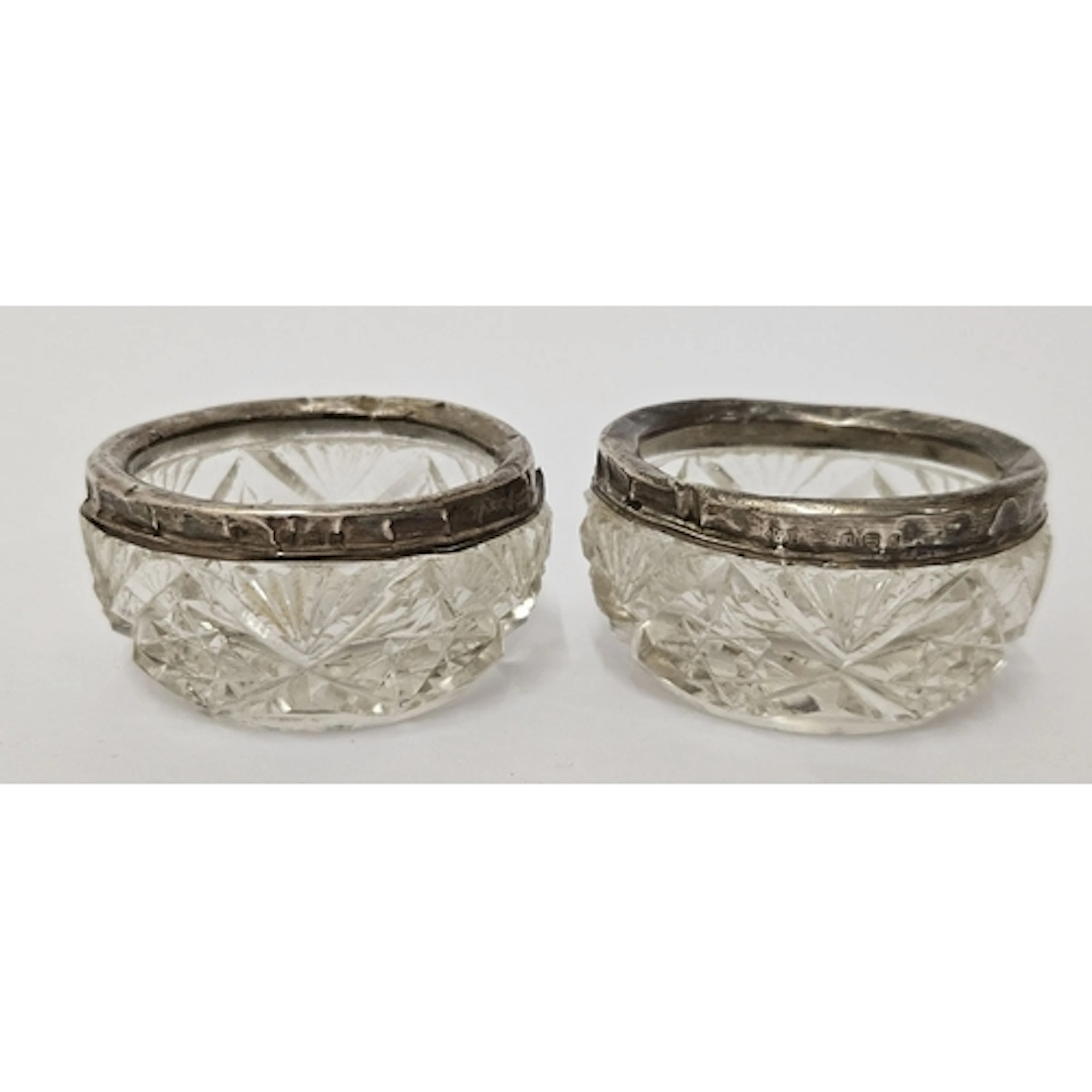 Pair Hob Star Cut Glass Salts with hallmarked silver lips, h...