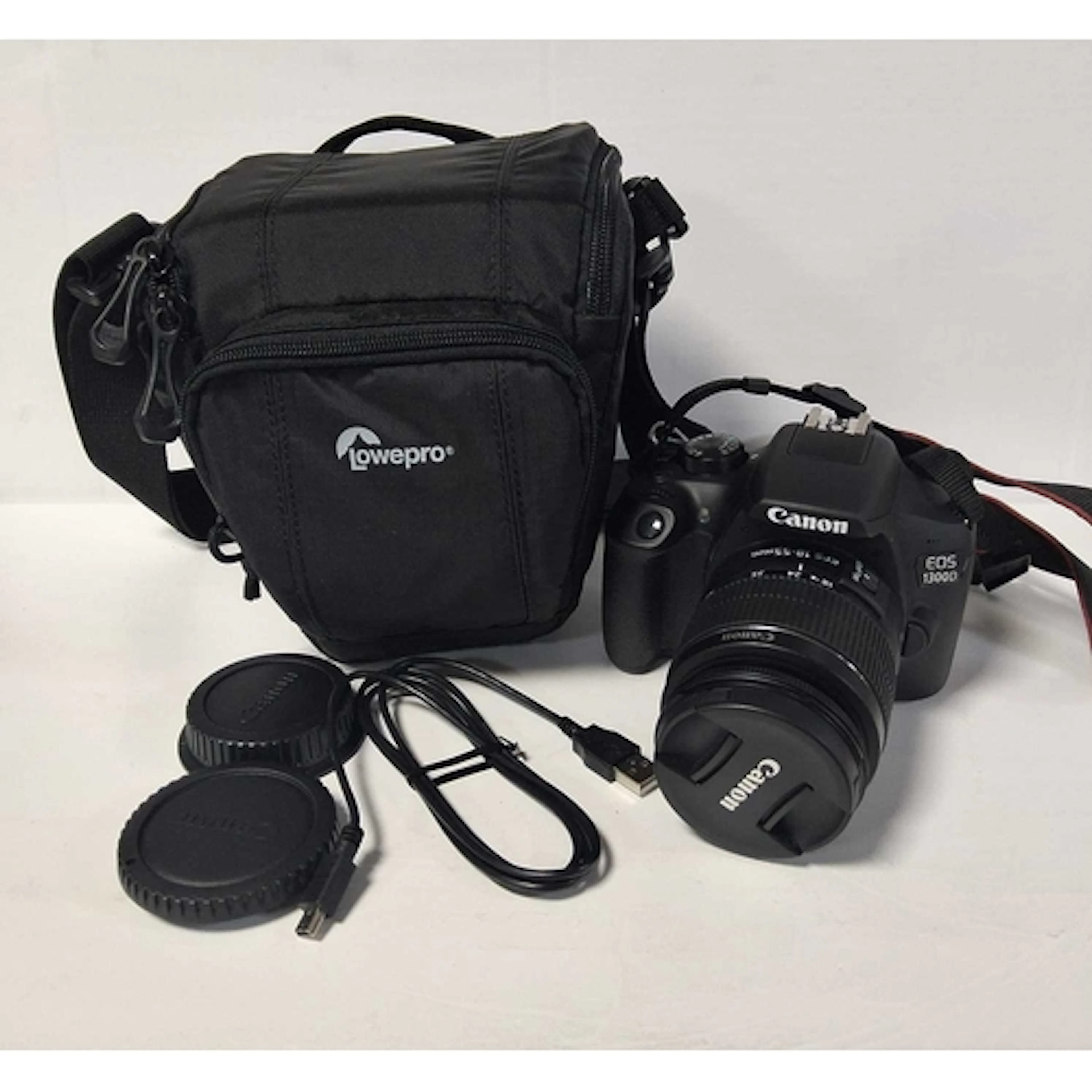 A CANON EOS 1300D DIGITAL CAMERA AND CARRY CASE, to include ...