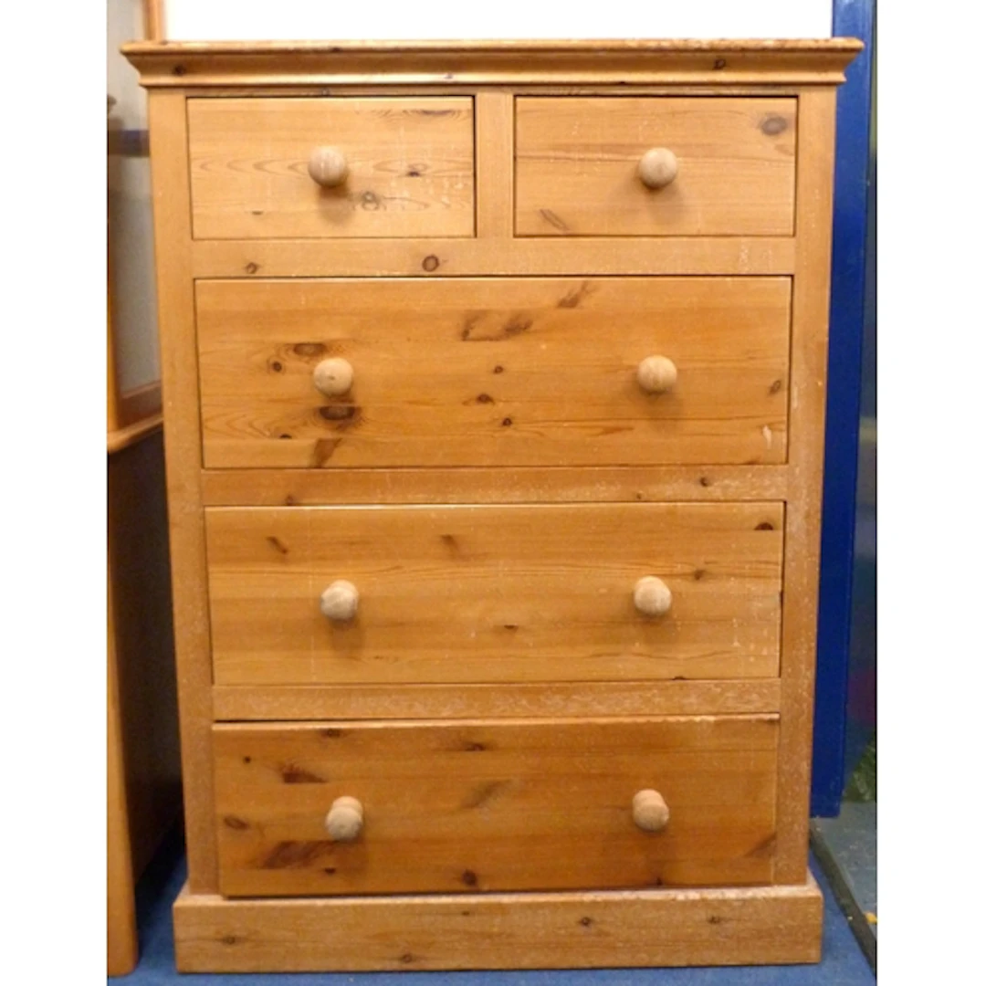 Pine chest of two short and three long drawers. 98cm wide.