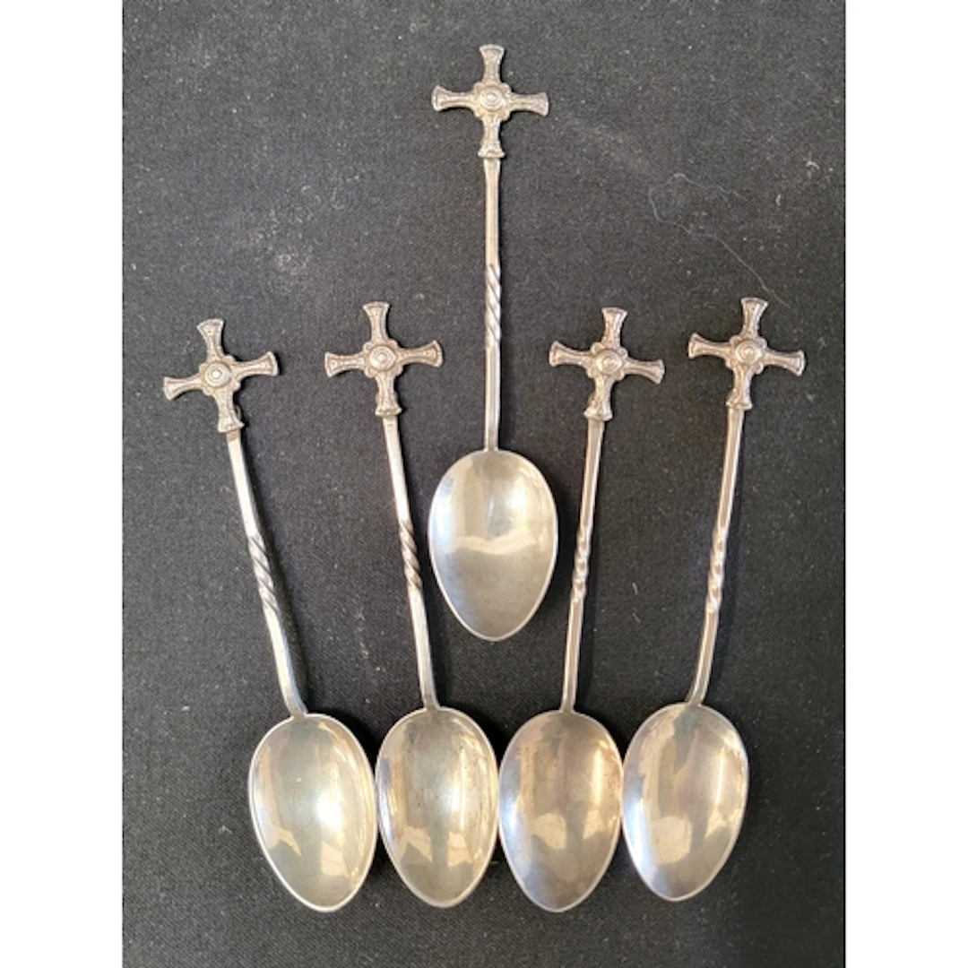 FIVE ST CUTHBERT'S CROSS CHRISTENING SPOONS featuring cross...