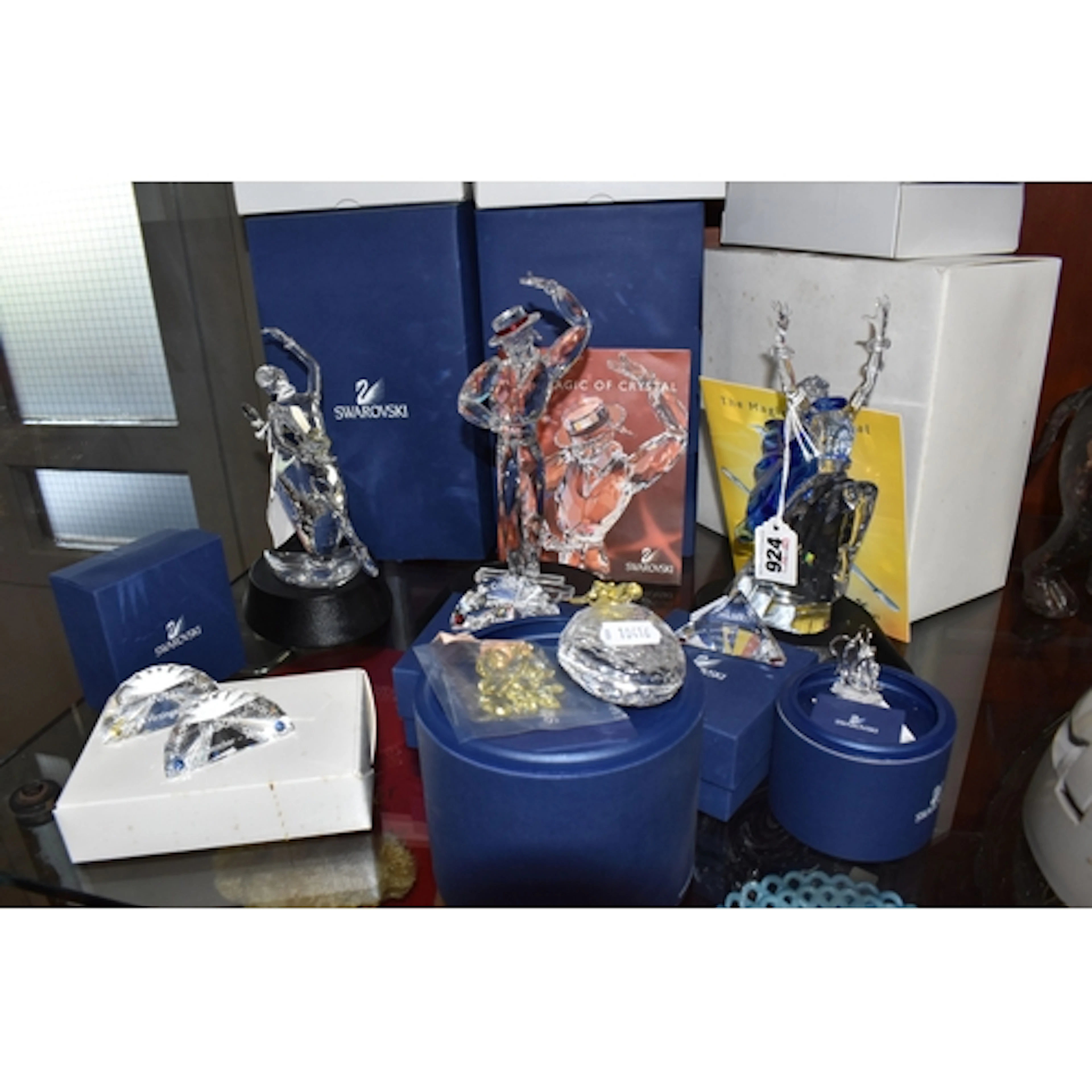 A BOXED SWAROVSKI CRYSTAL MAGIC OF DANCE TRILOGY OF FIGURES,...