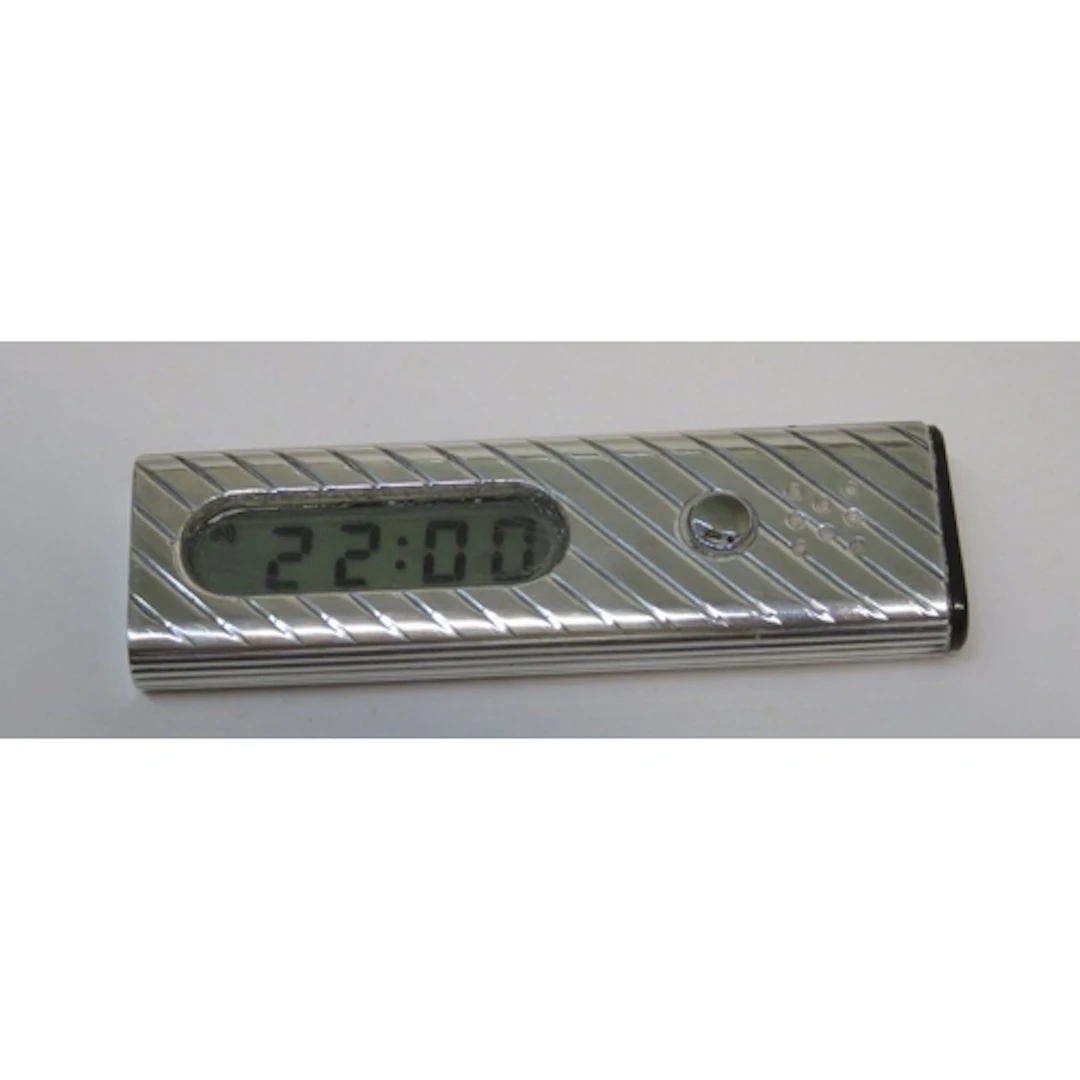 Silver cased travel alarm clock