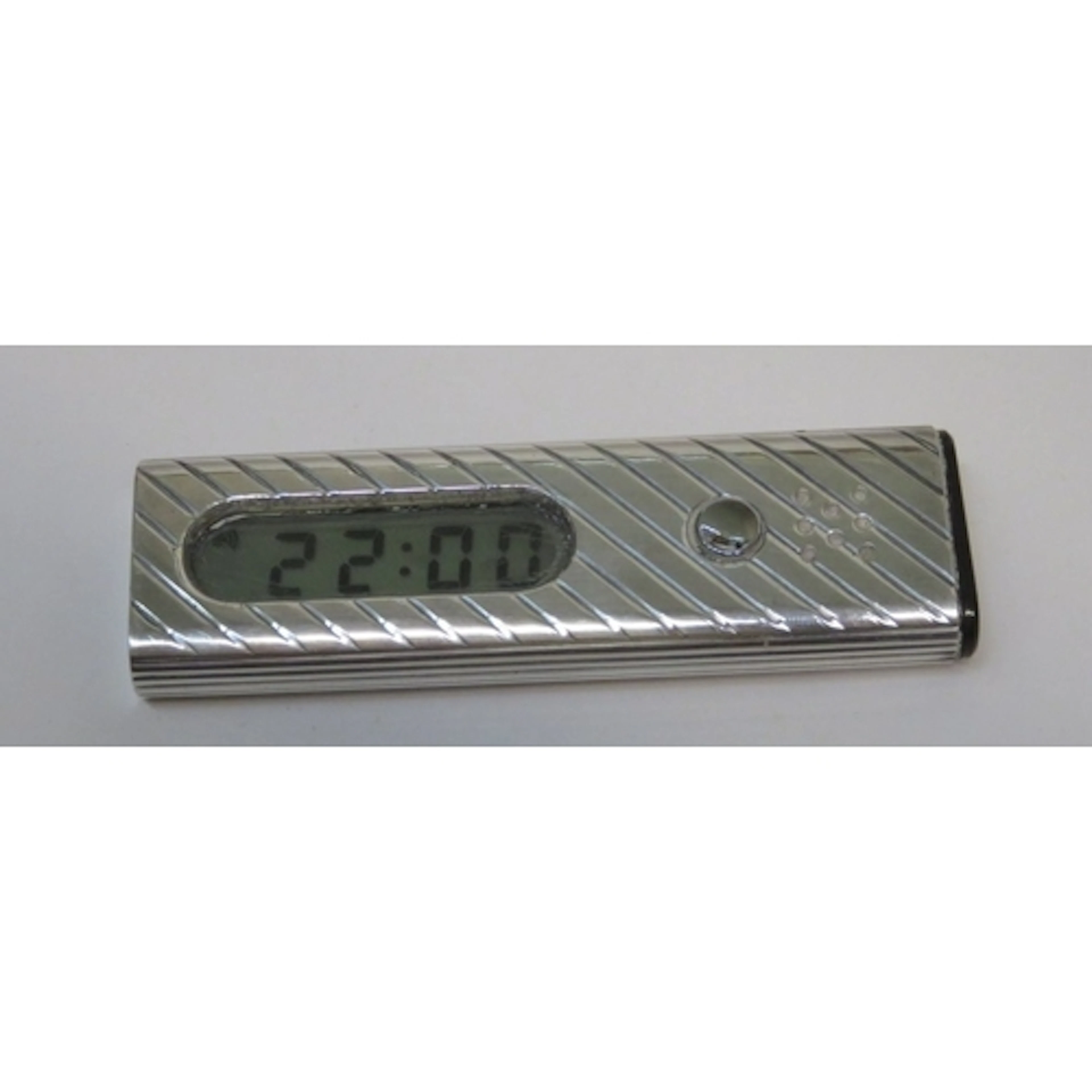 Silver cased travel alarm clock
