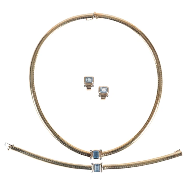 A gold and synthetic spinel parure, comprising: a necklace, ...