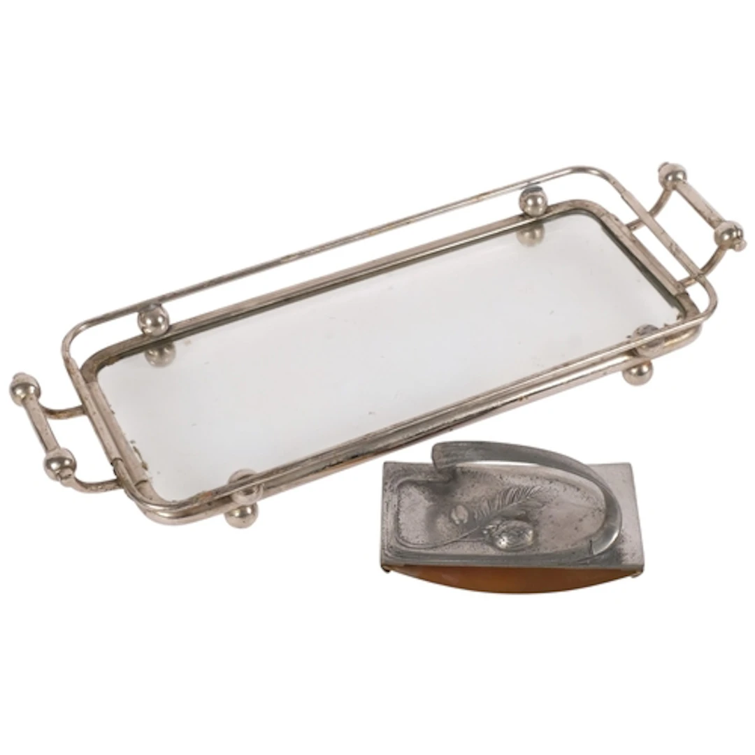 An Art Nouveau silver plated glass based and galleried twin-...