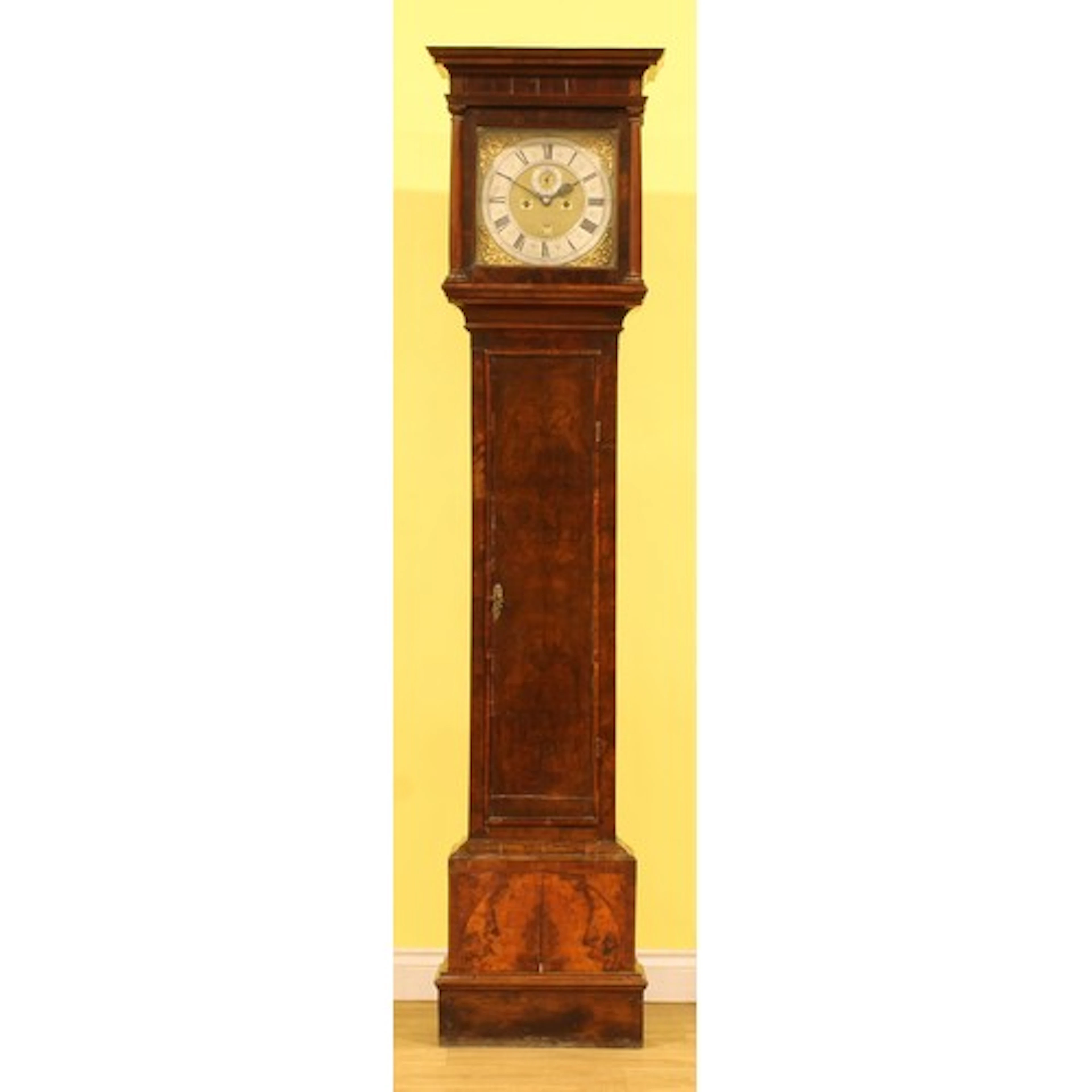 A George II walnut longcase clock, the brass and silvered di...