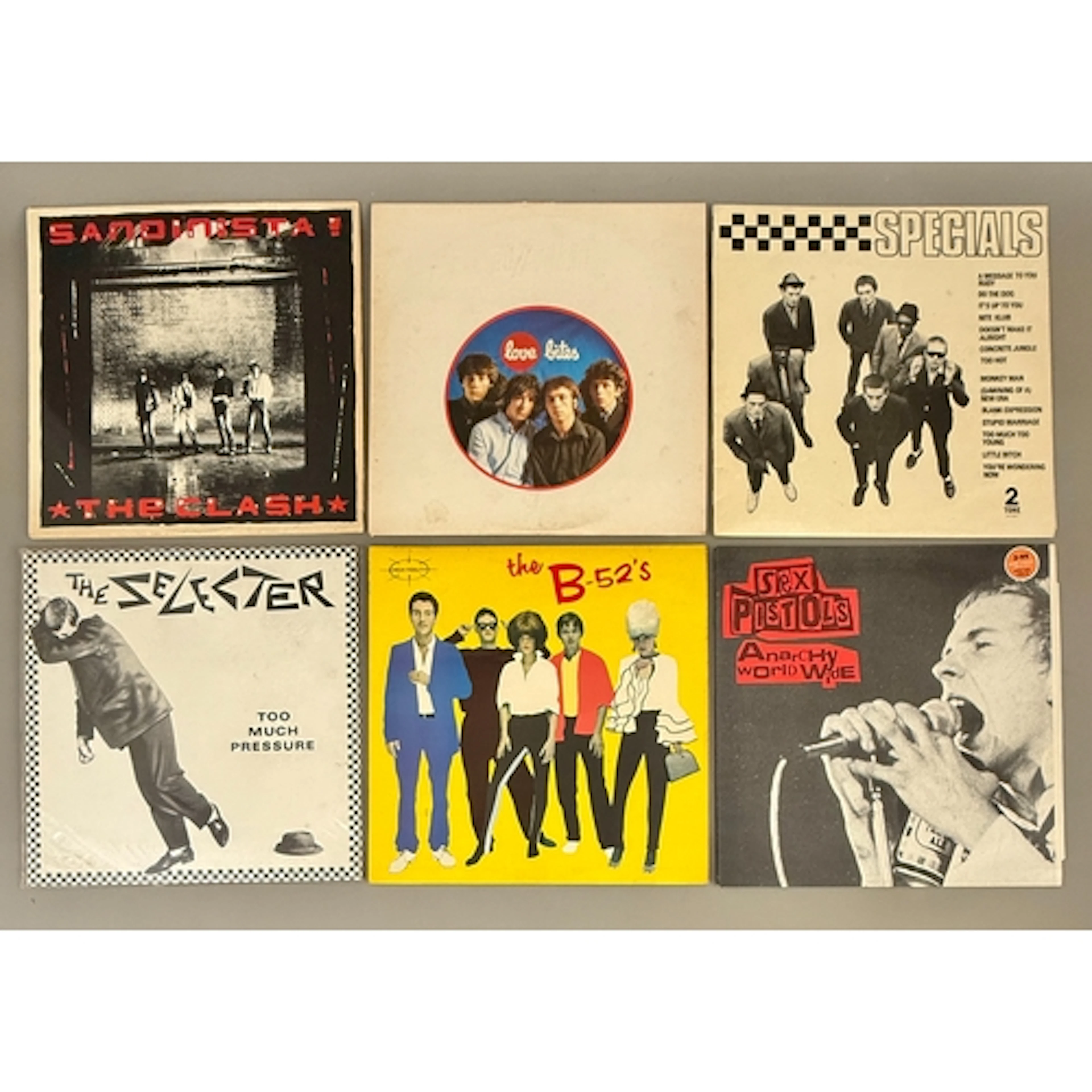 12 Punk, New Wave and 2-Tone LP's including: The Clash, Buzz...