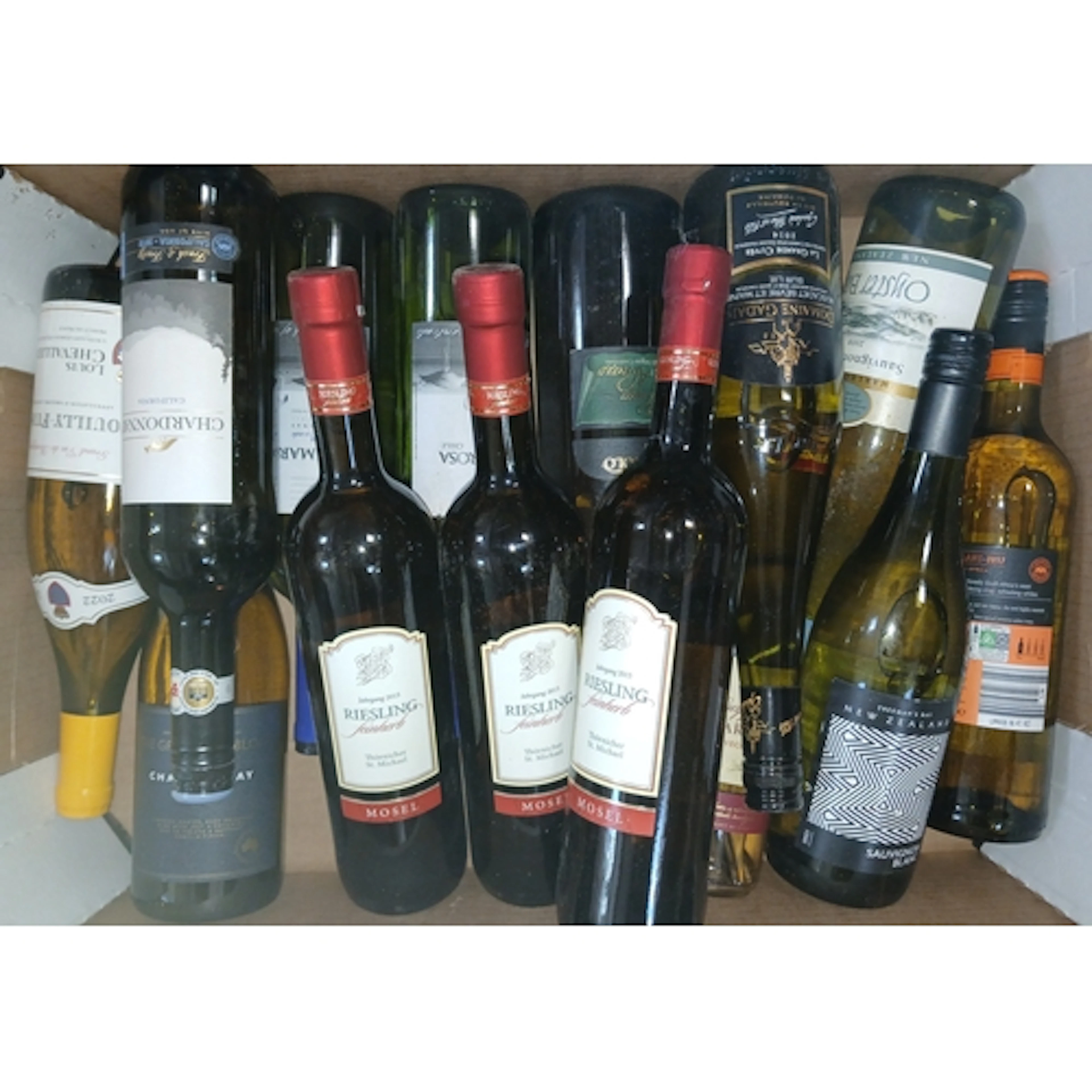 Eight boxes of assorted white wines.
