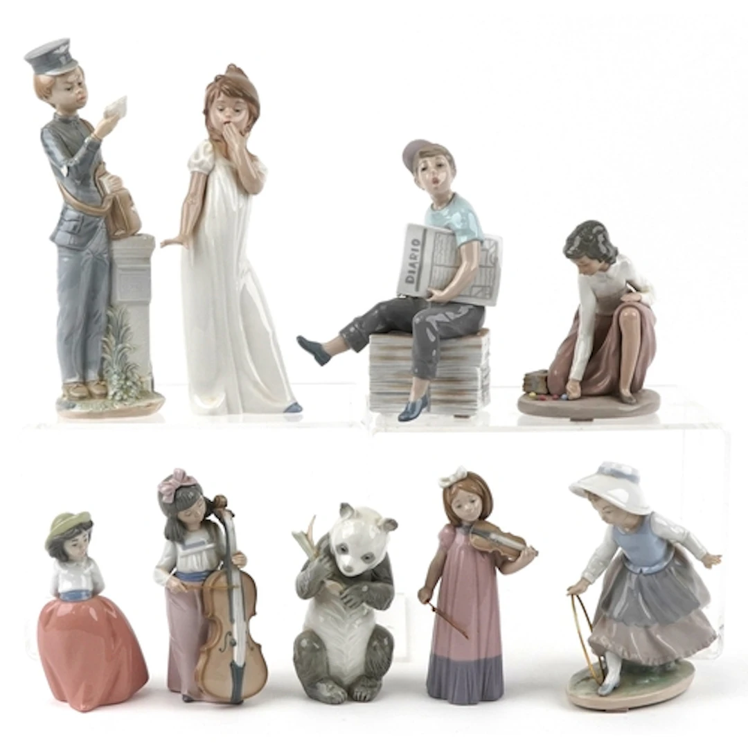 Nine Nao porcelain figurines including Postman, Newpaper Sel...