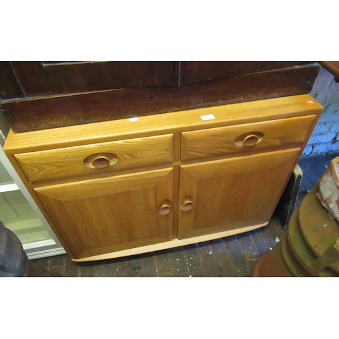 Ercol Windsor, small ash sideboard with two drawers above tw...