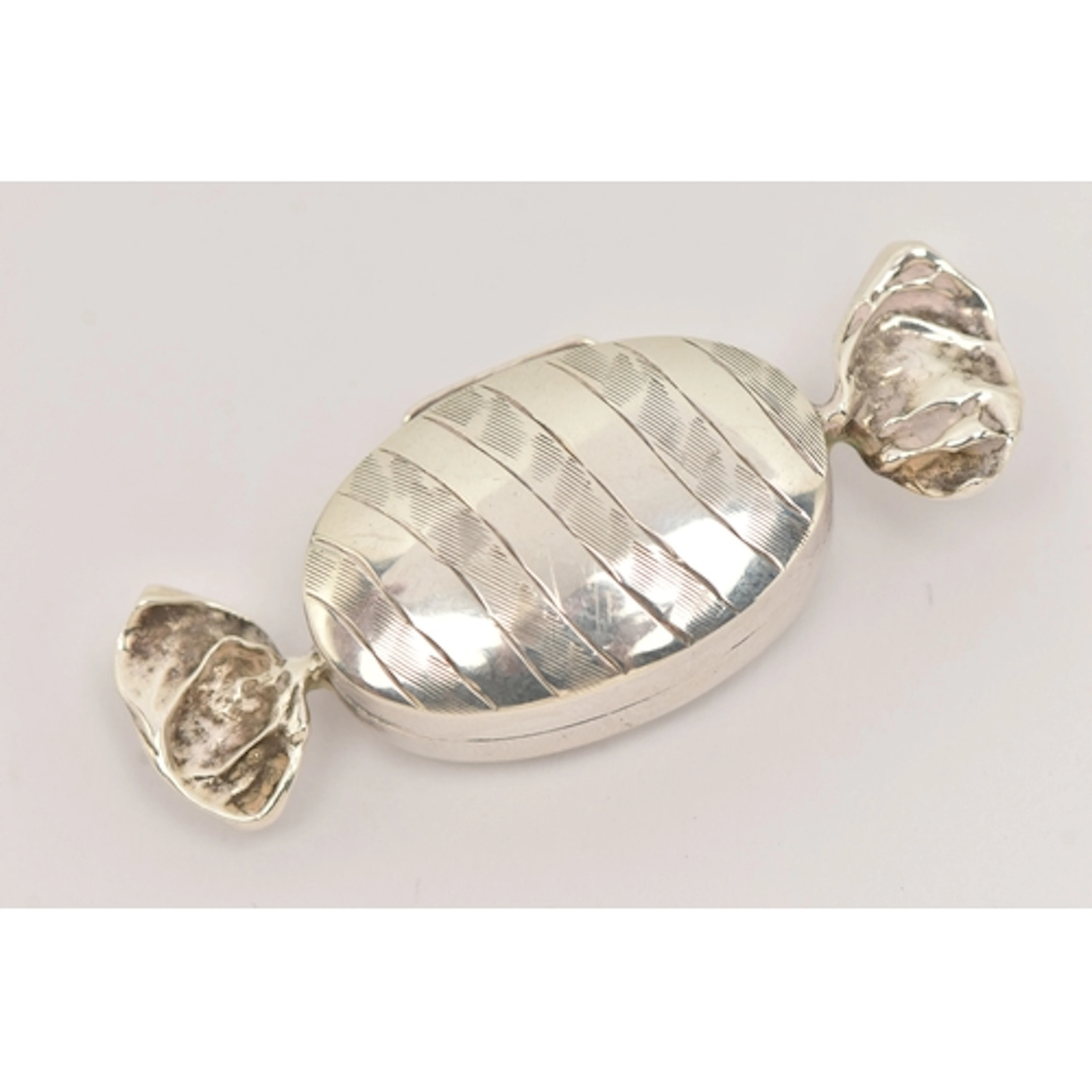 A WHITE METAL SWEET SHAPE PILL BOX, unmarked metal, hinged c...