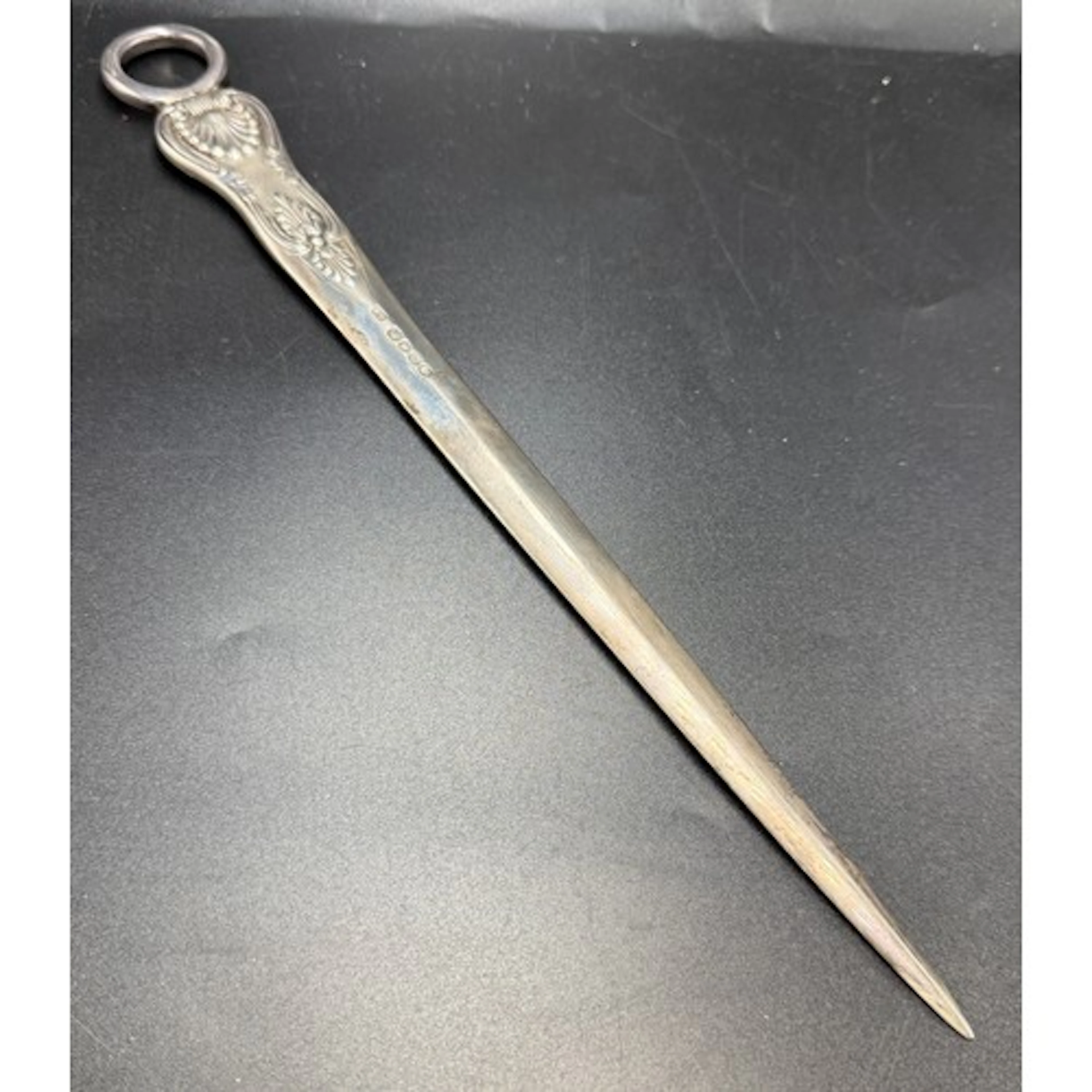 A Victorian silver meat skewer. London 1839, maker Edward Ba...