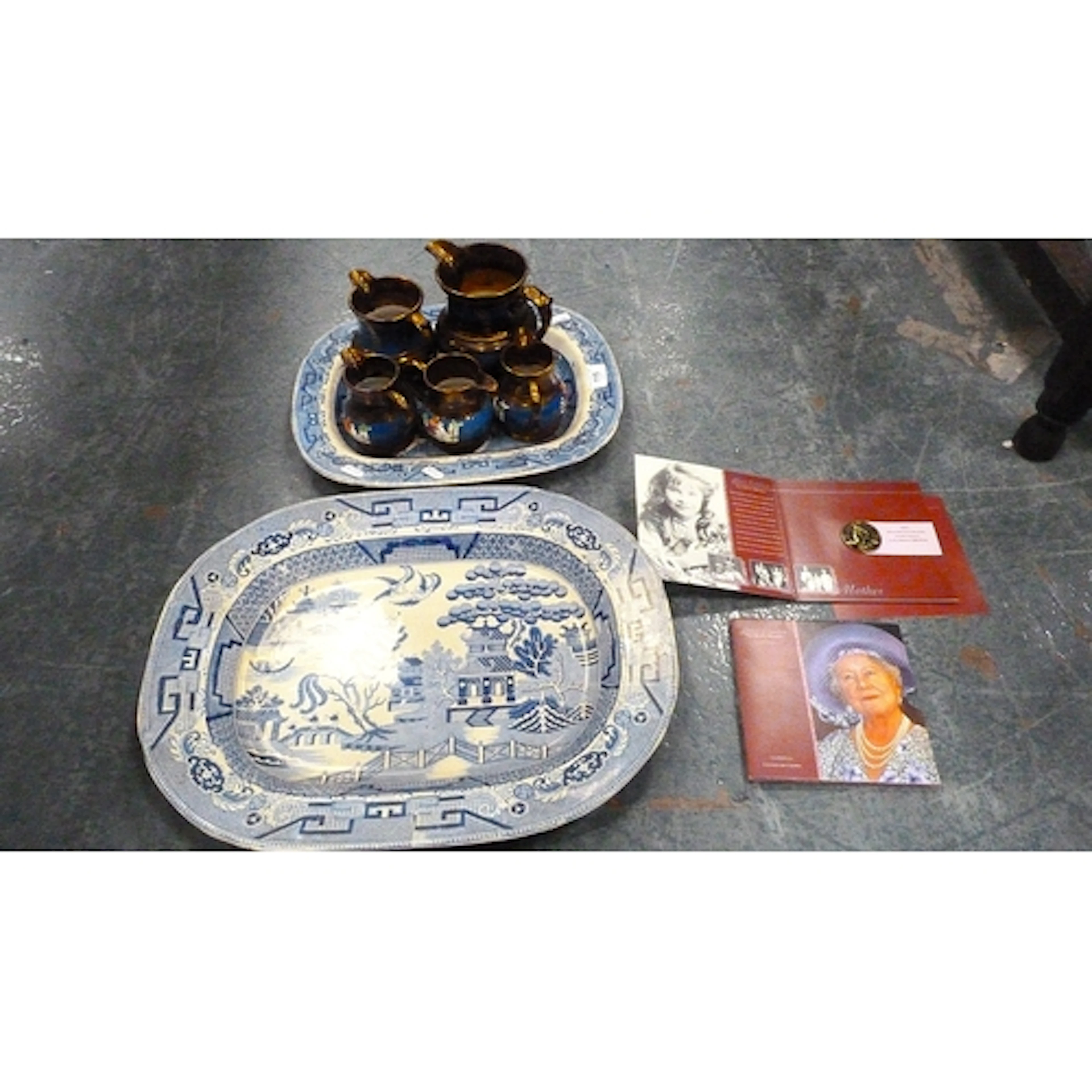 Two Old Willow pattern ashets, lustre ware jugs, and Queen E...