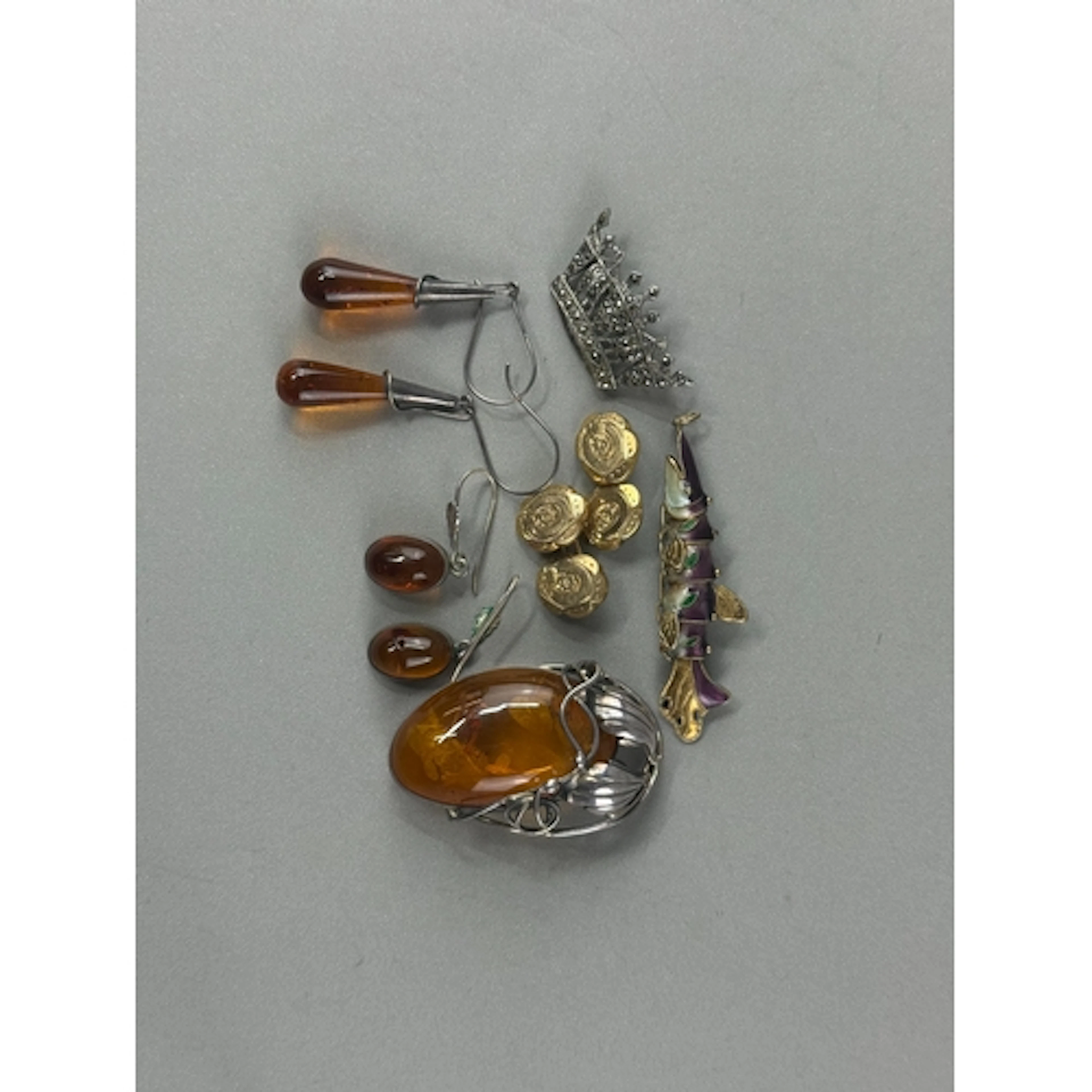 Jewellery: Two pairs of silver and amber drop earrings, an o...