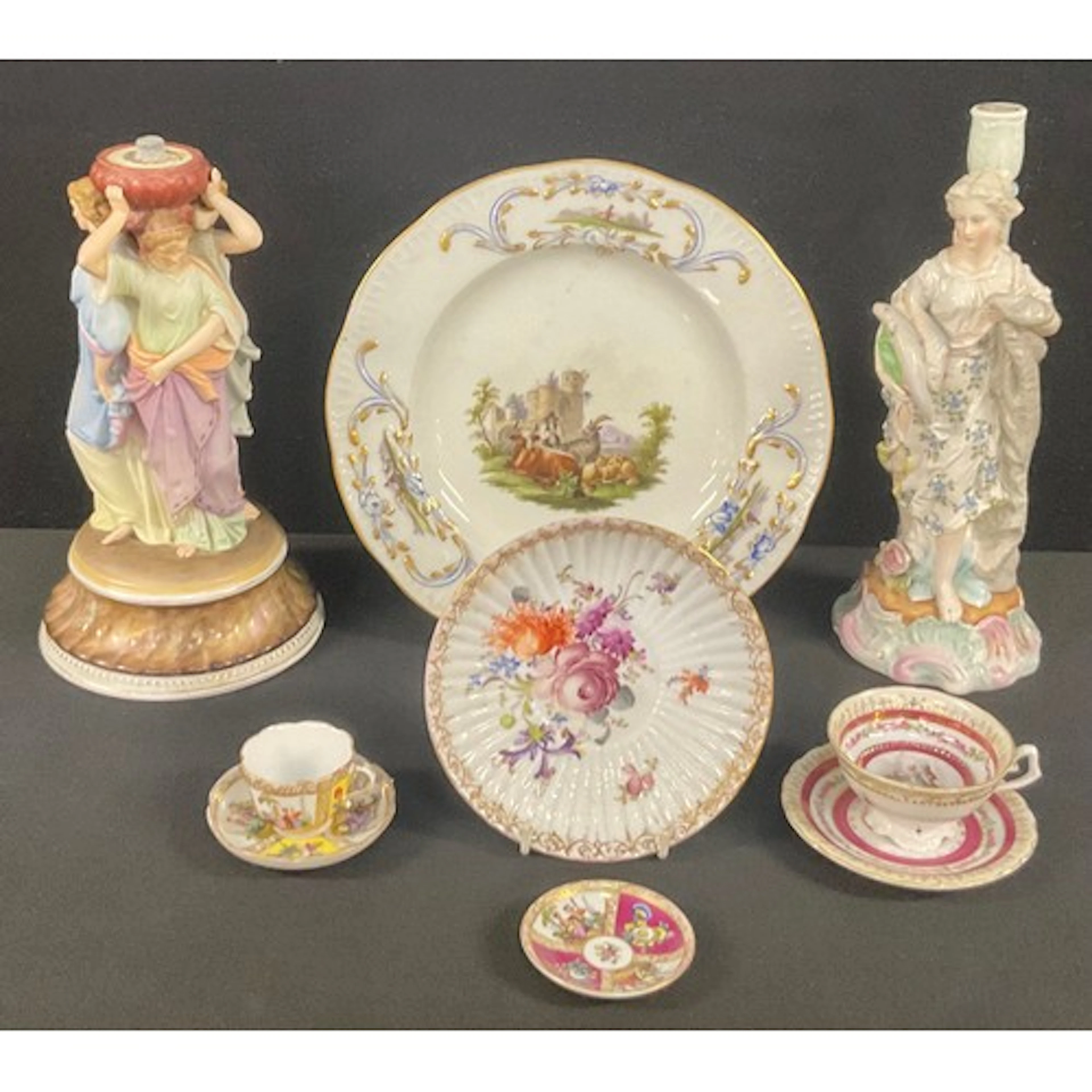 A Meissen plate, painted with cattle herd and ruins, raised ...