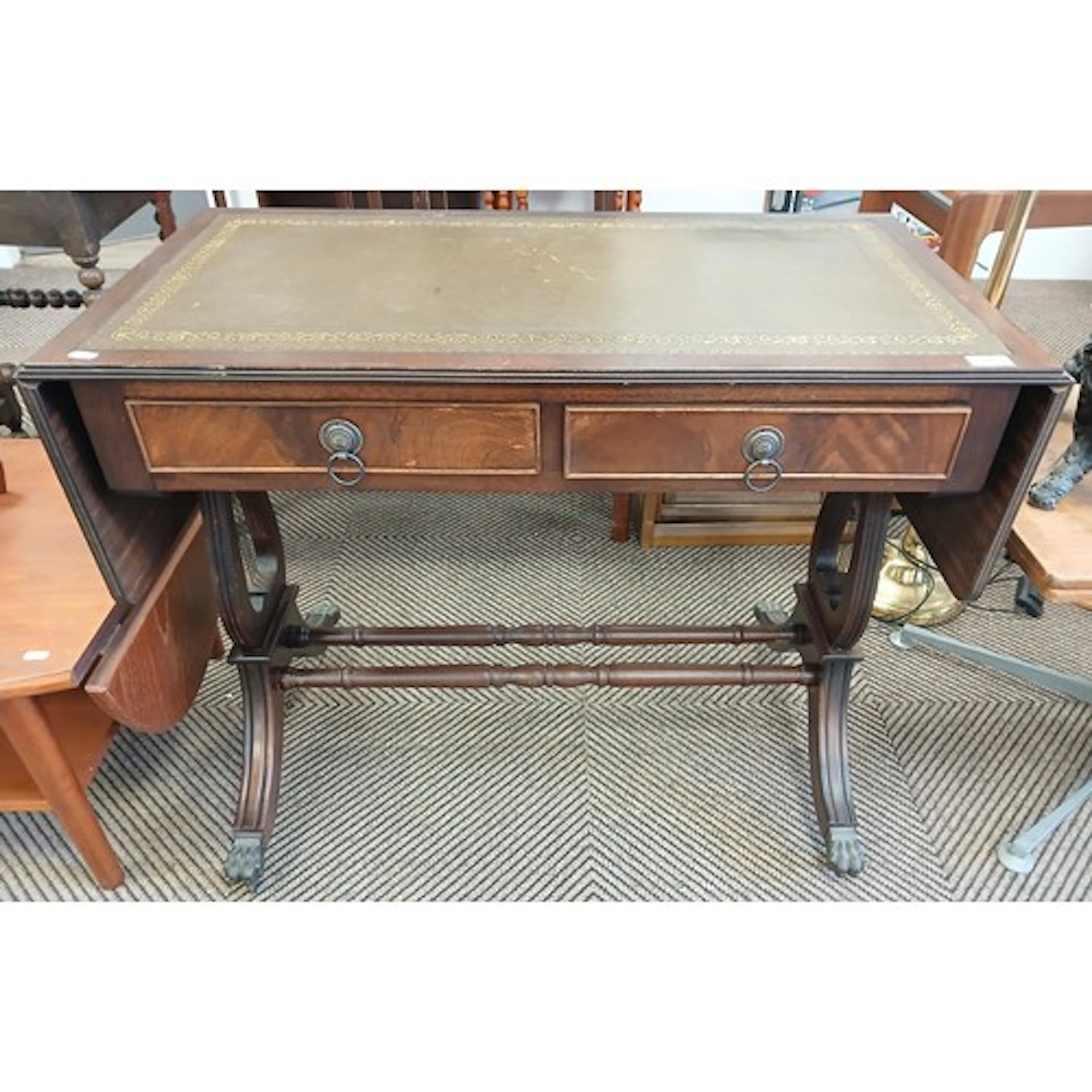 Reproduction mahogany sofa table.