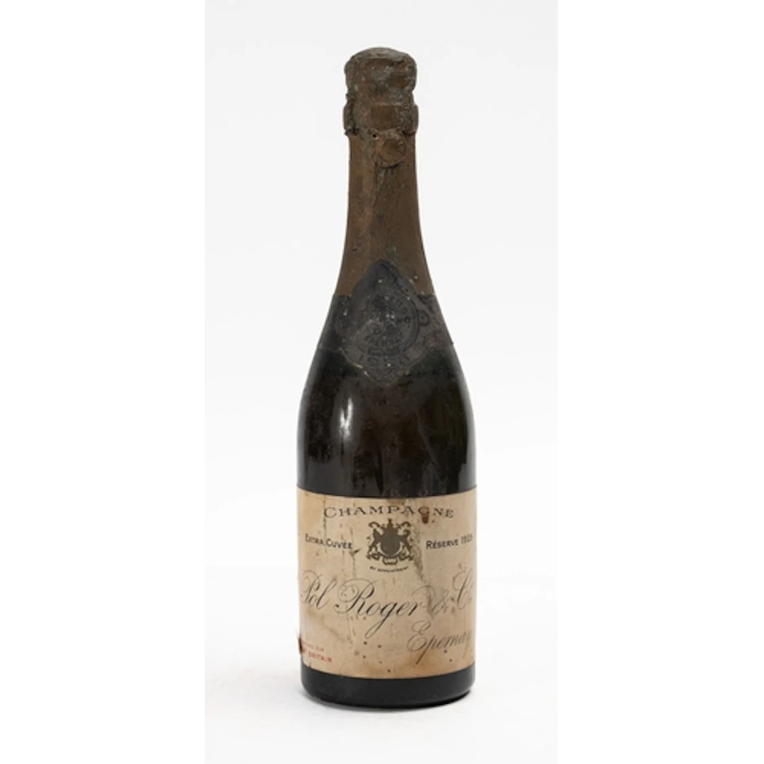 A bottle of Pol Roger Reserve 1928 Champagne. Half size bott...