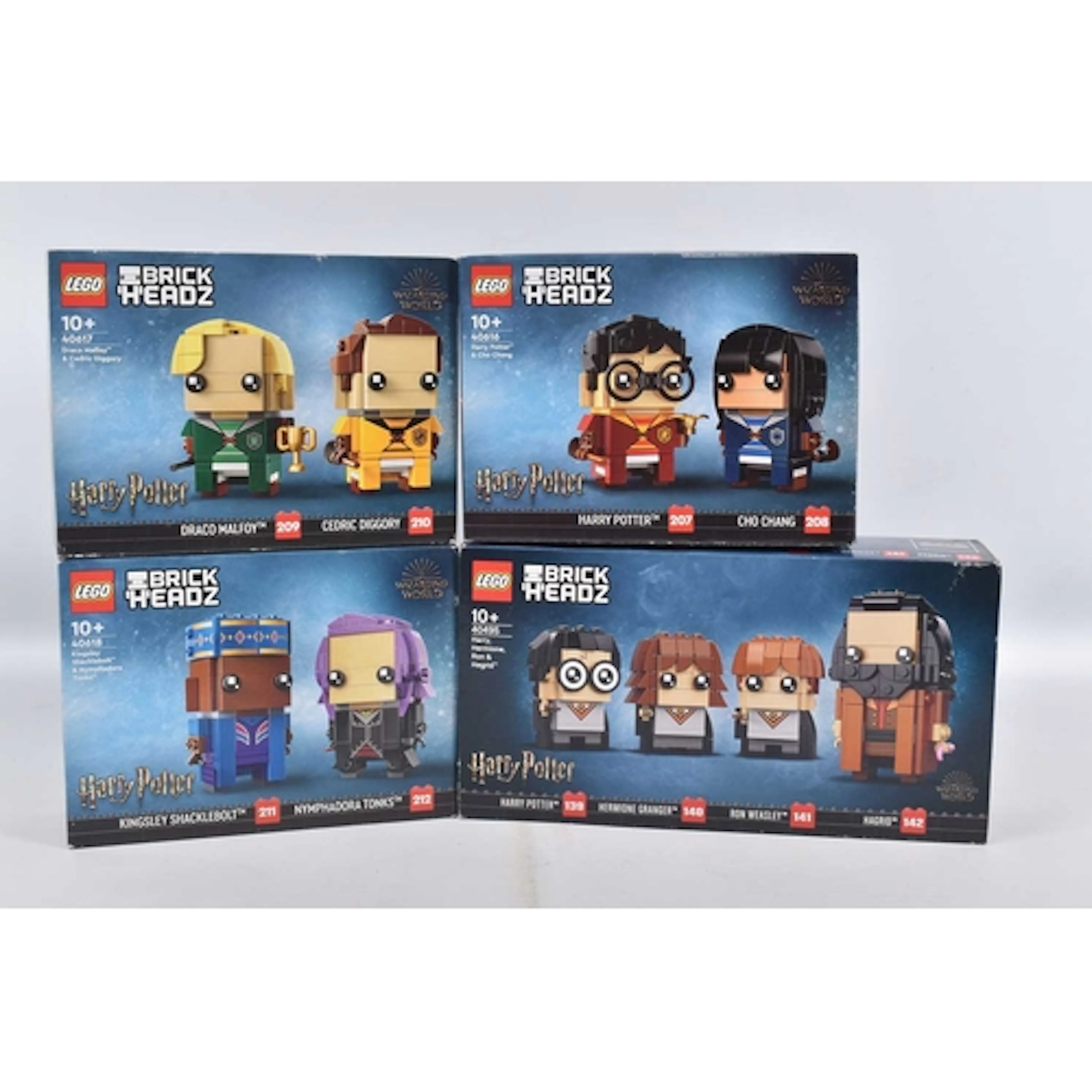 FOUR BOXED AND SEALED HARRY POTTER LEGO BRICKHEADZ, to inclu...