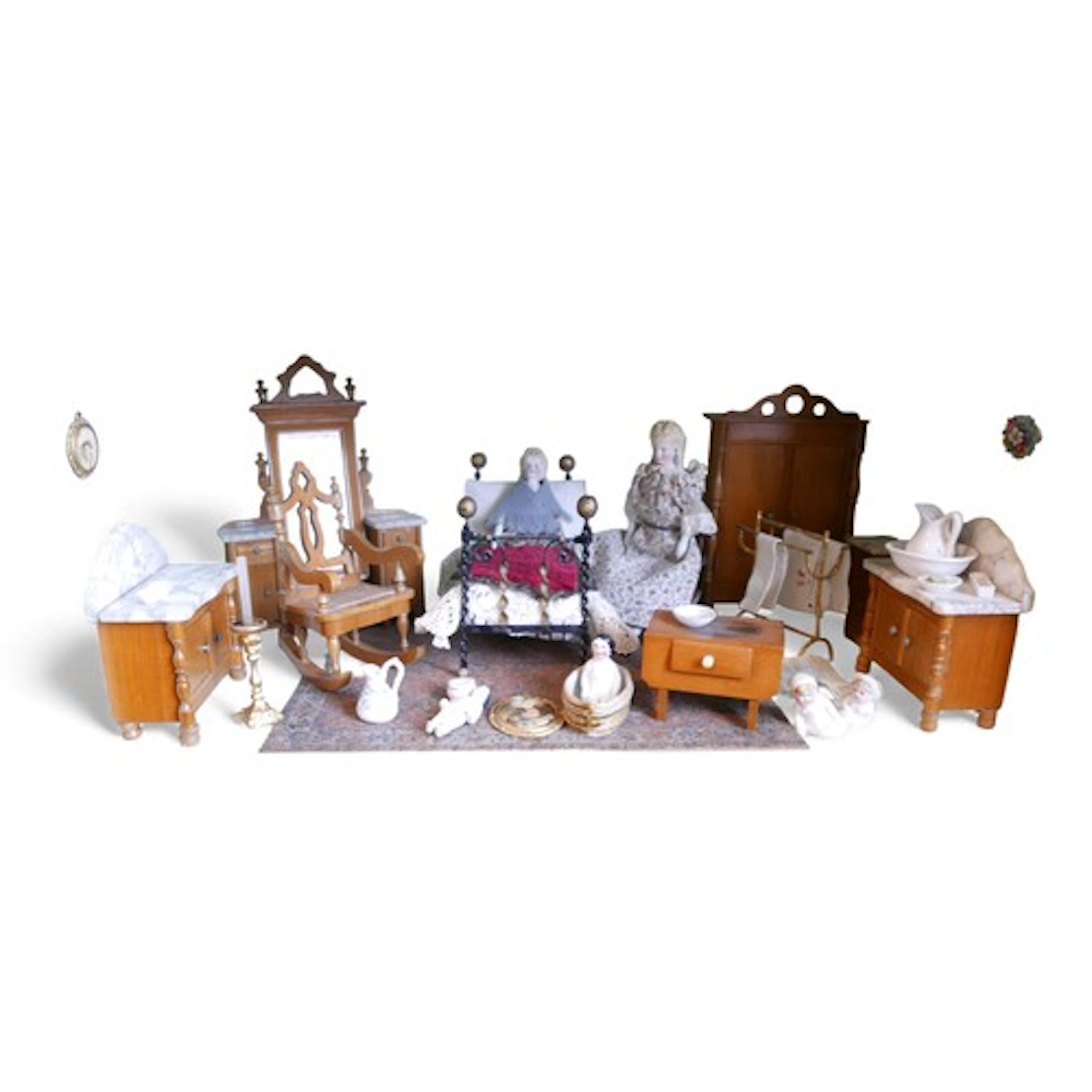 A doll's house room layout, comprising a group of bedroom fu...