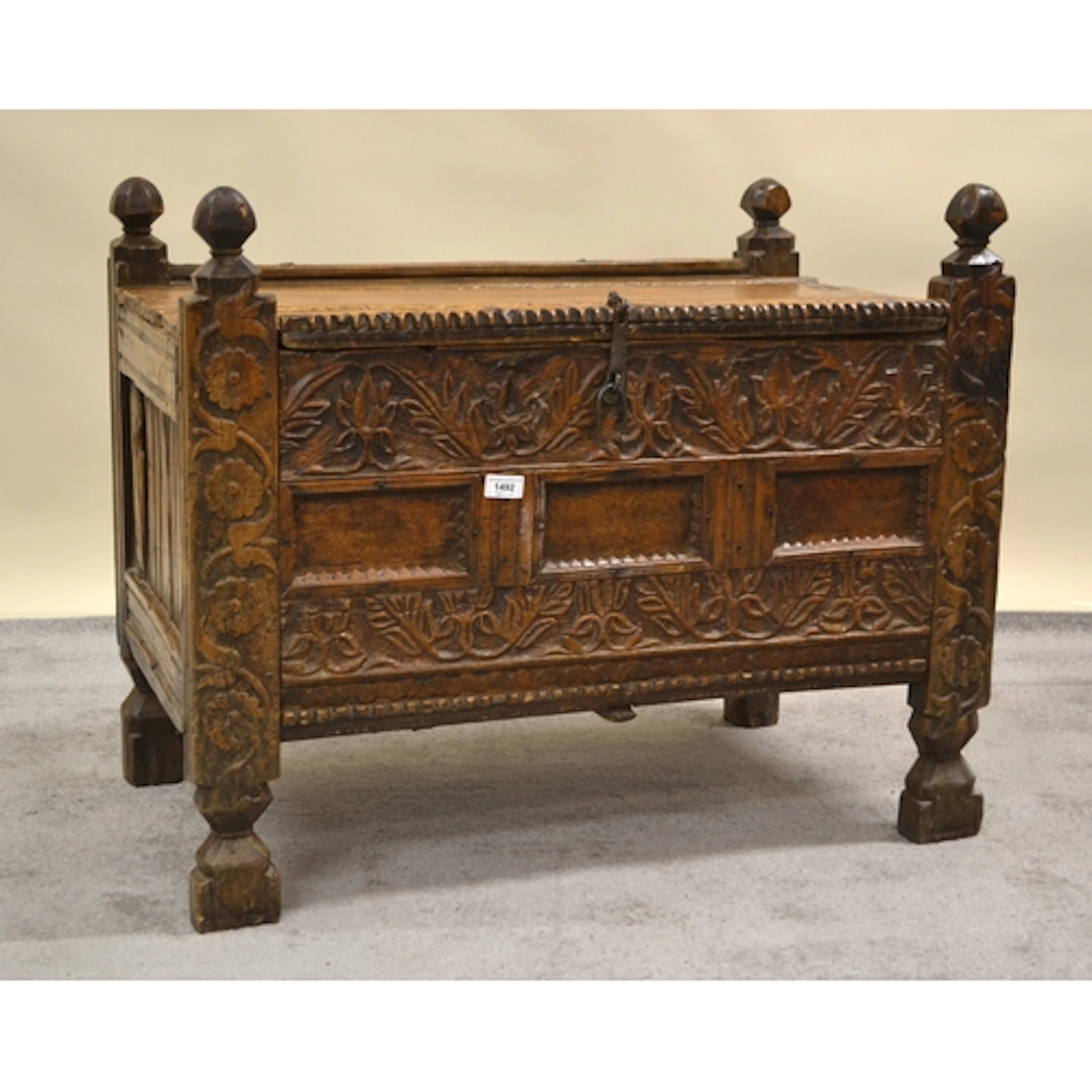 Antique Indian dowry chest, the hinged lid above a carved an...