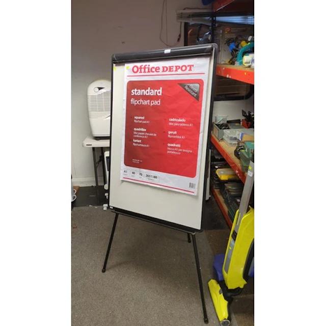 Freestanding flipchart easel with a white writing surface, b...