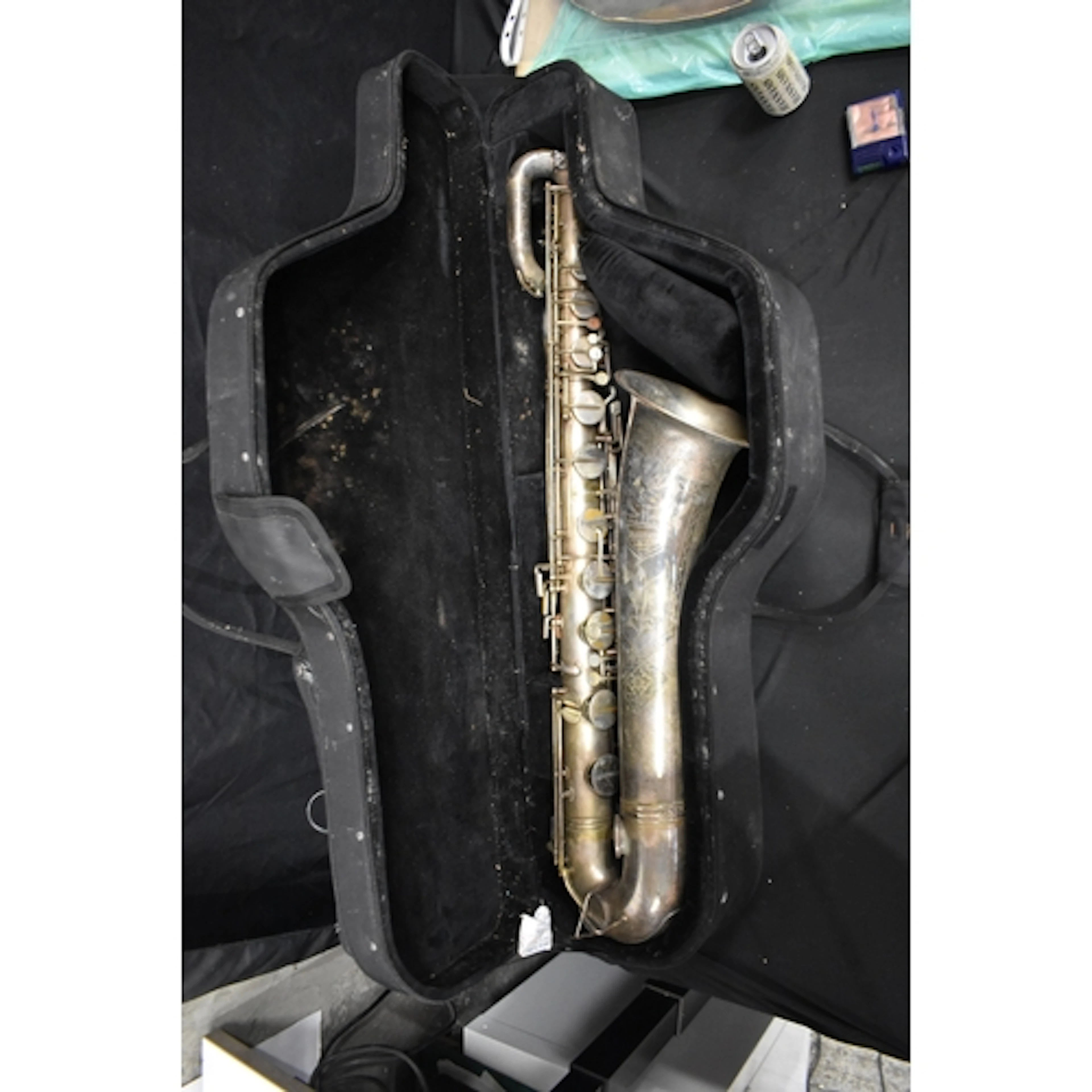 A vintage cased Regent Baritone Saxophone by The British Ban...