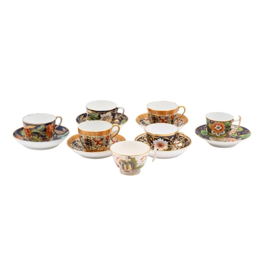 A group of six early 19th century Coalport and other cups an...