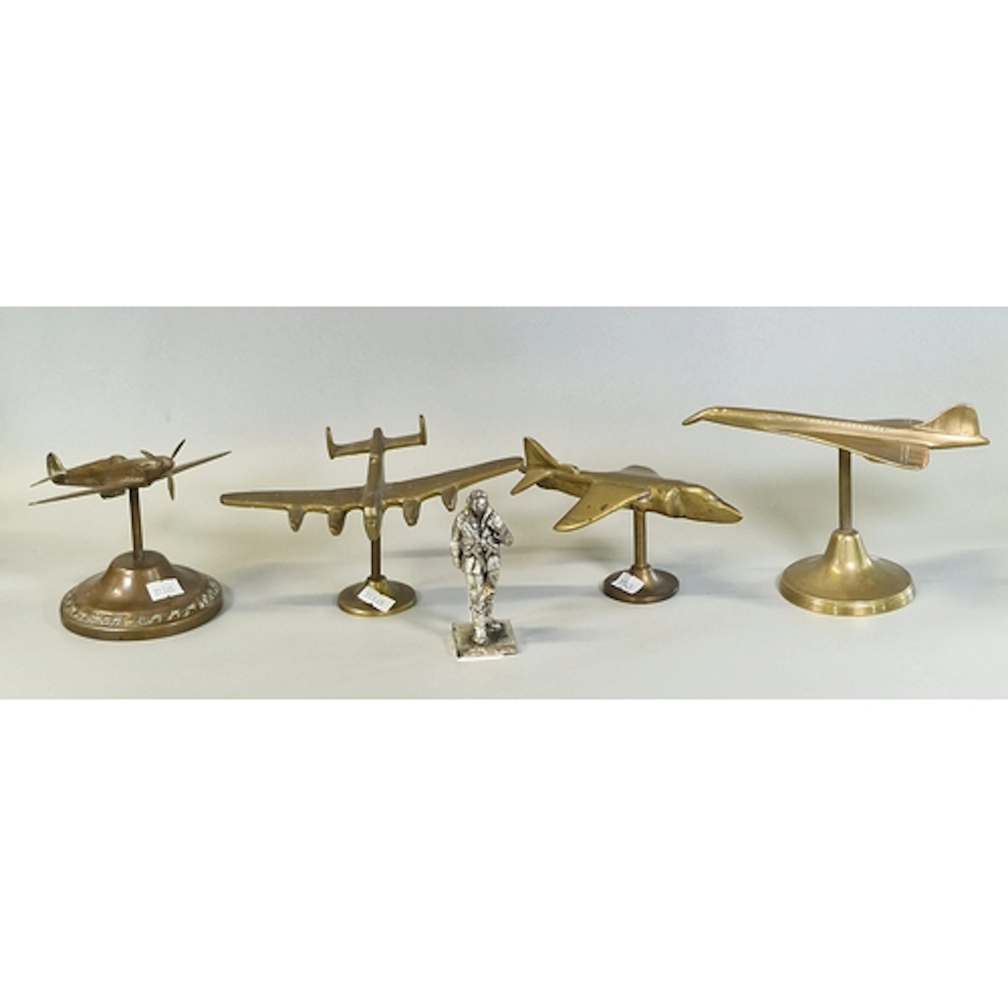Three brass aircraft desk top models, Harrier Jump Jet, Conc...