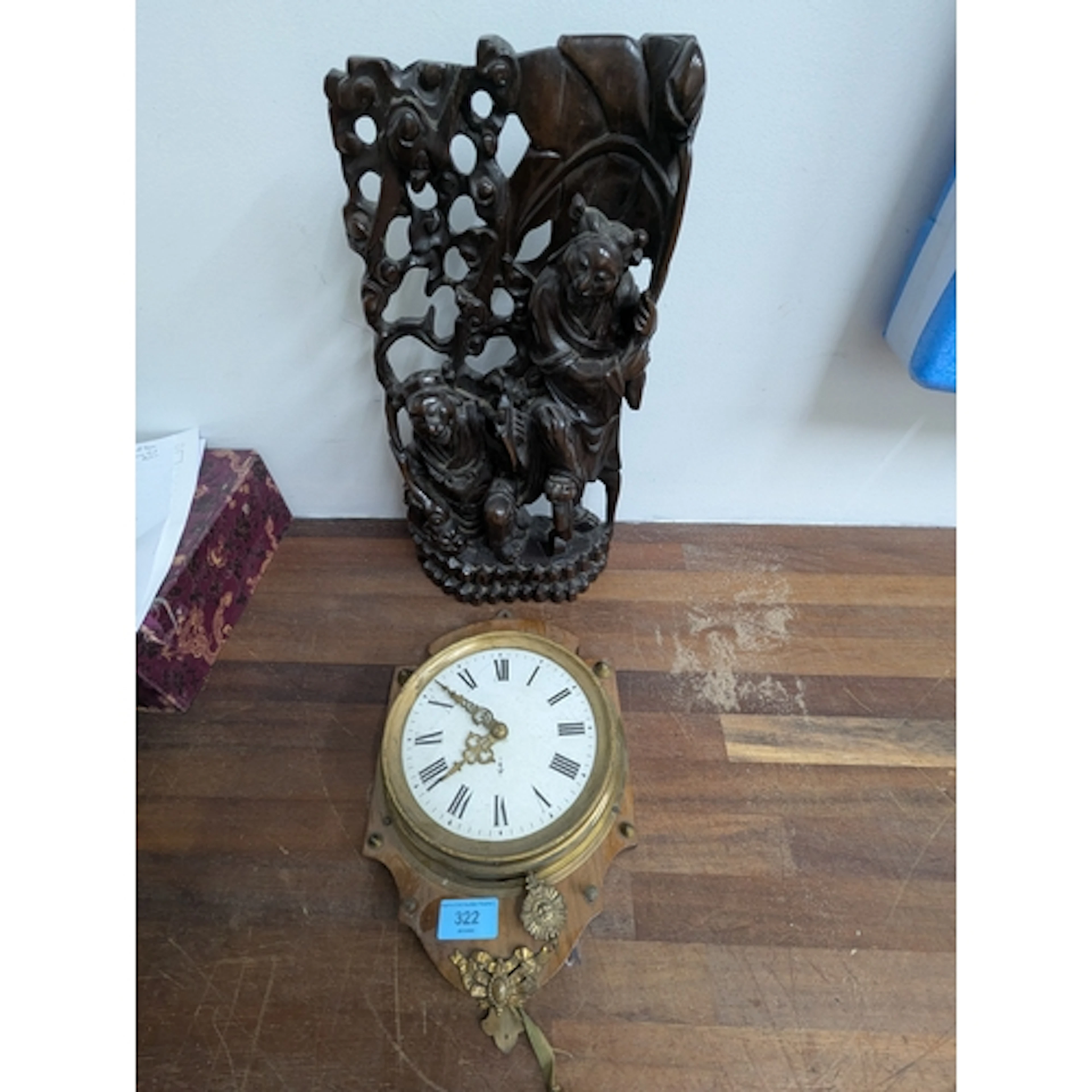 A late 19th century French wall clock with a watch style mov...