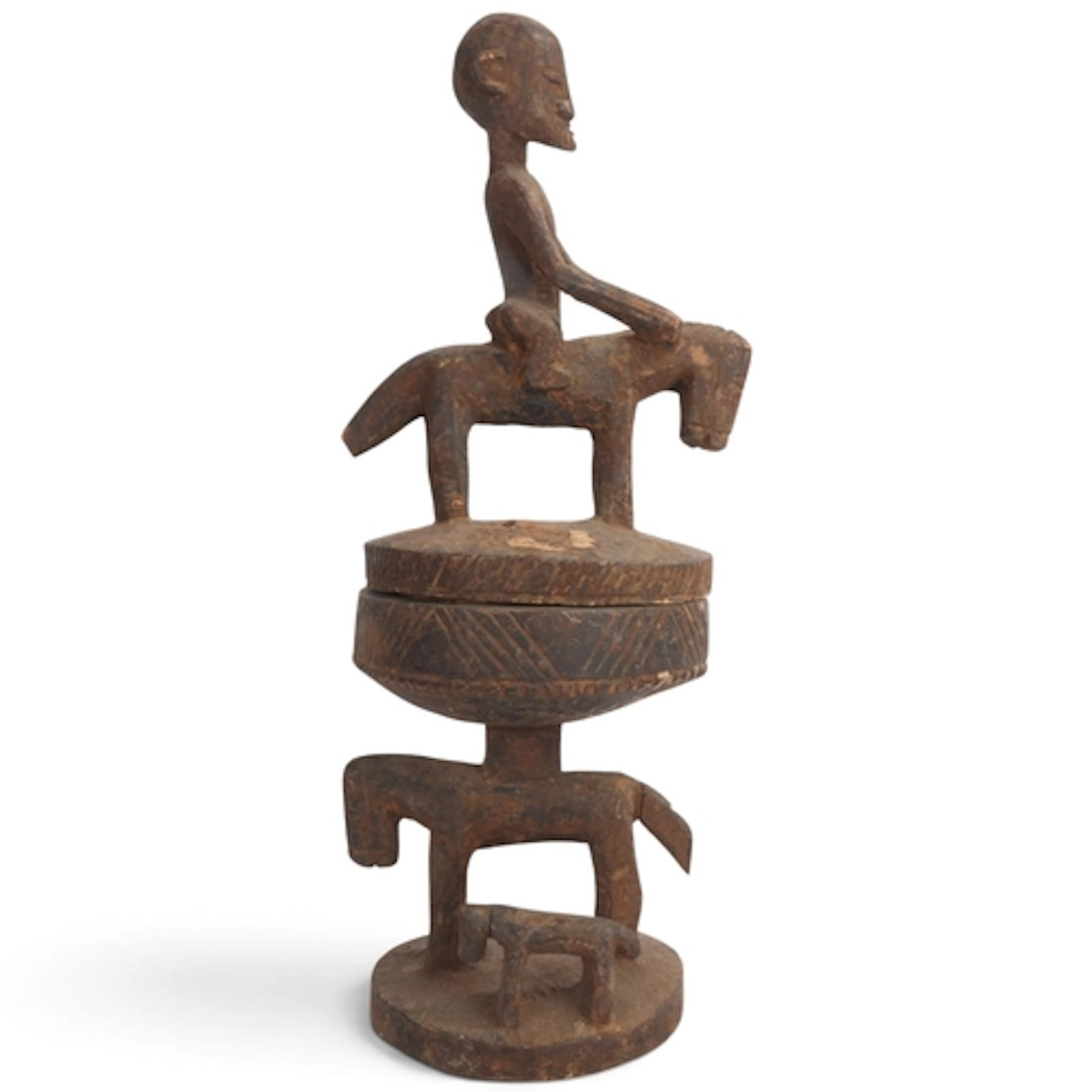 A Dogon lidded container, Mali, surmounted by horse and ride...