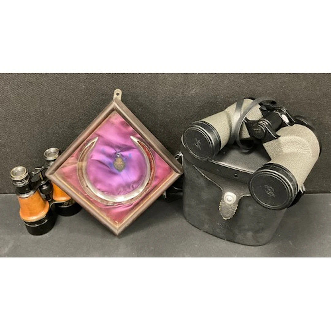 A pair of WWI field binoculars, etched broad arrow, annotate...