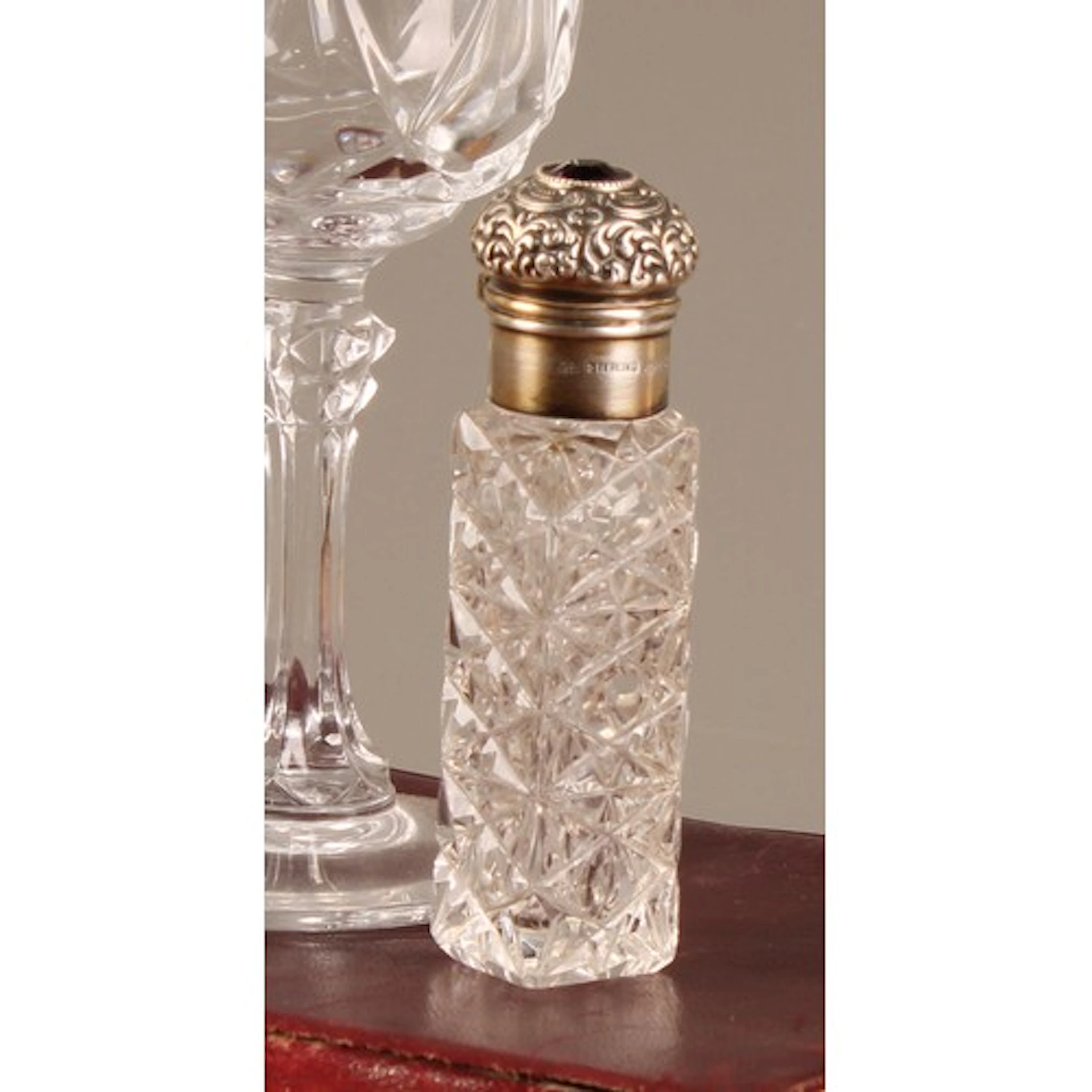 A late 19th century American silver mounted hobnail cut glas...