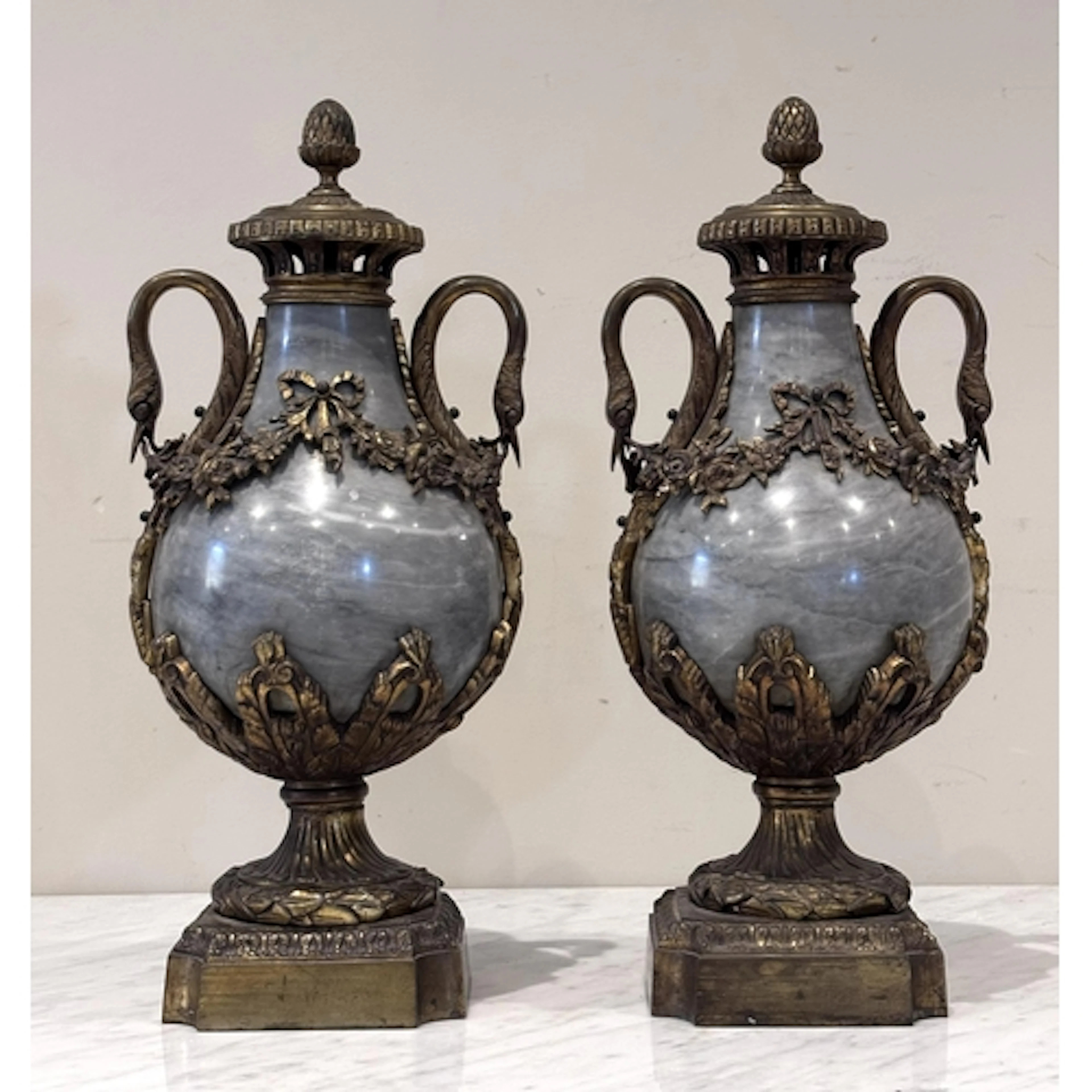 A pair of French Louis XVI style grey marble and ormolu moun...