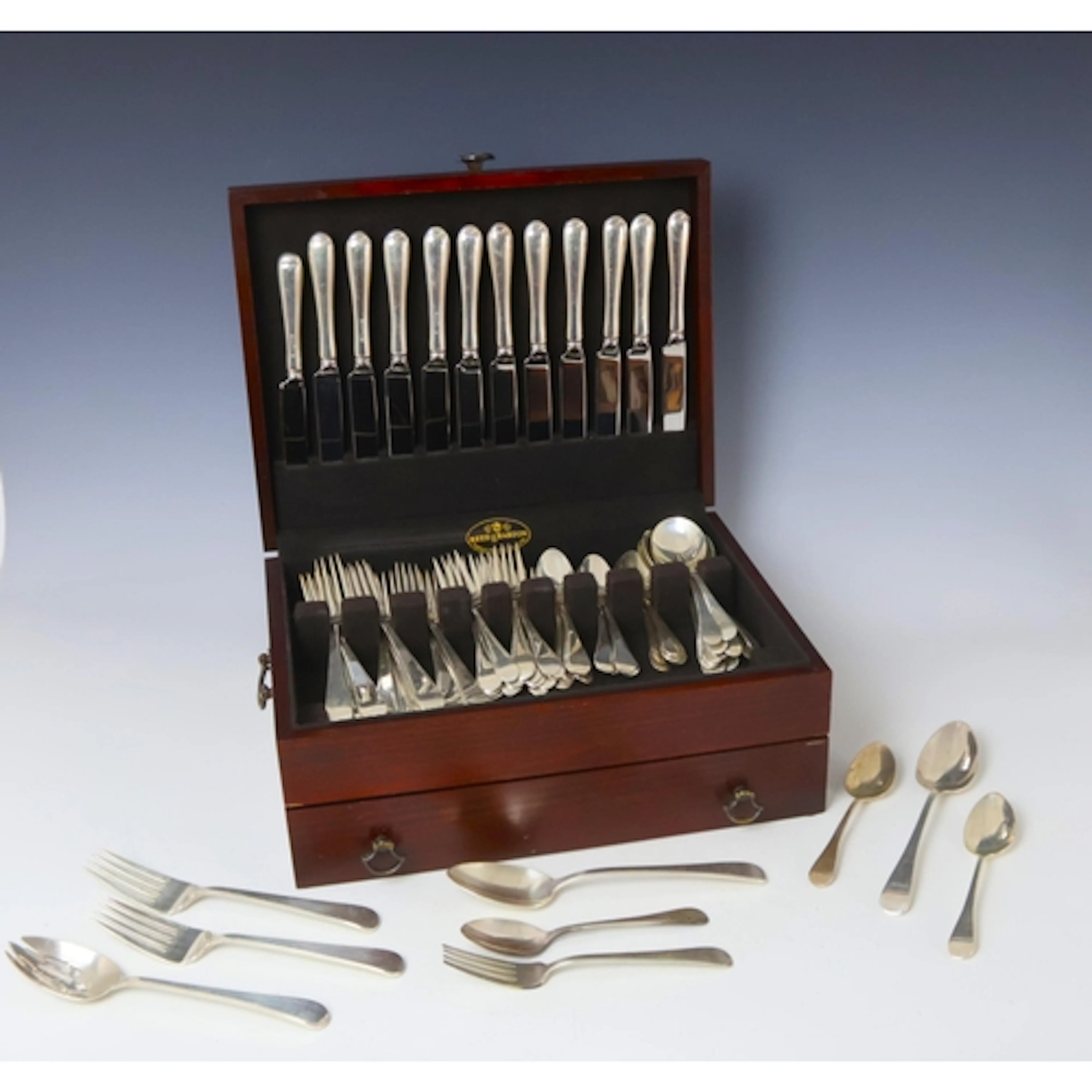 An American canteen of contemporary Tuttle silver flatware, ...