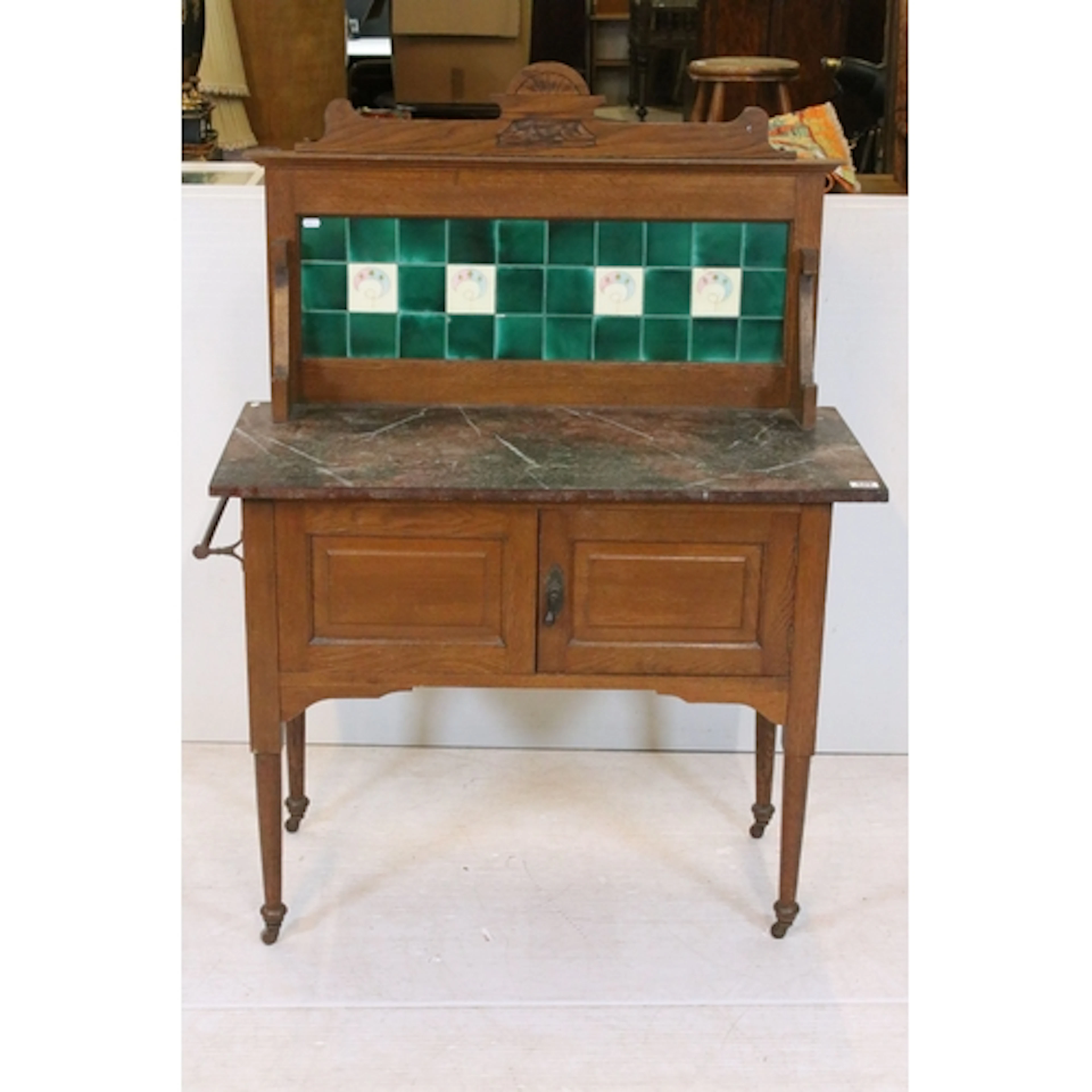 Early 20th century oak washstand with Art Nouveau tiled back...