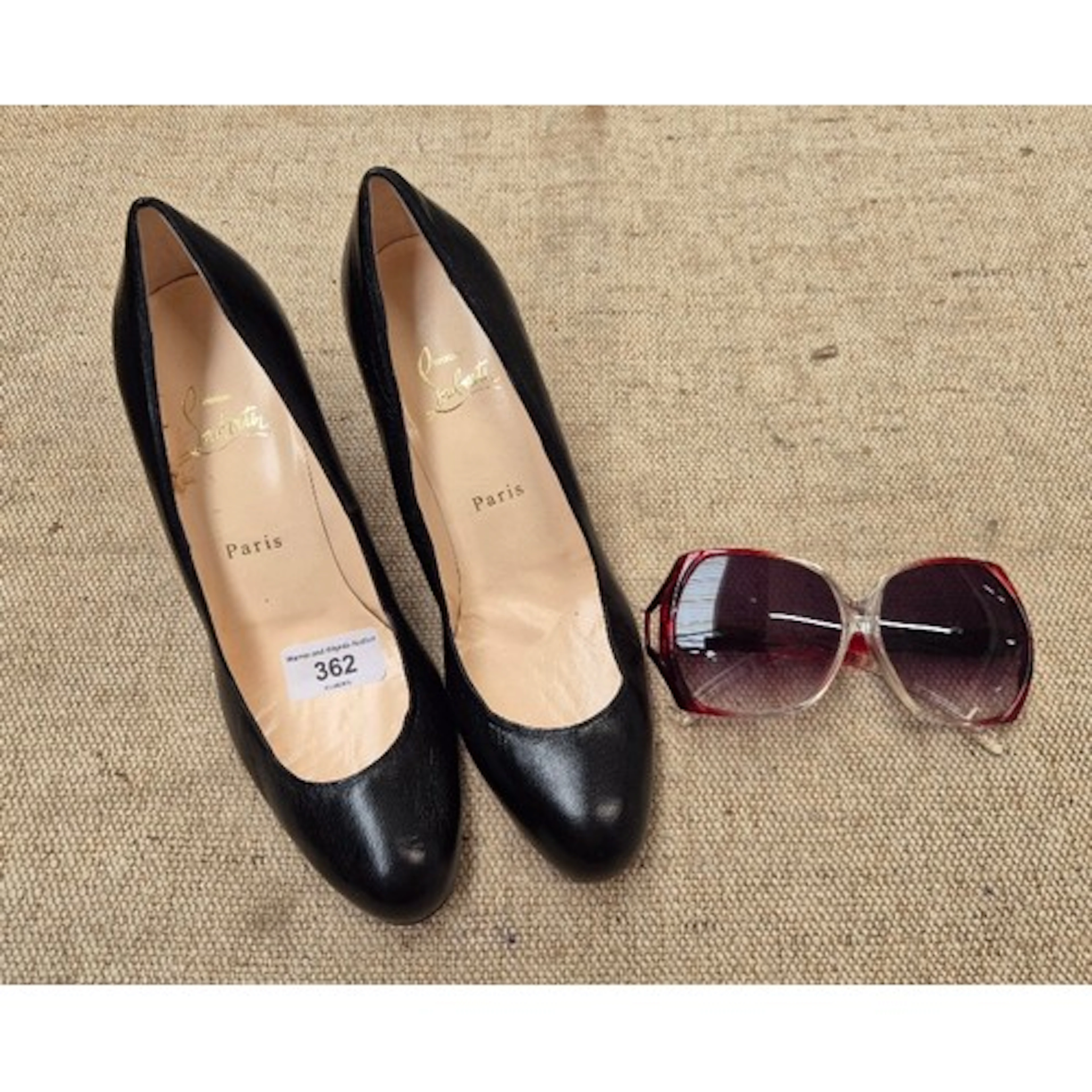 Pair of Christian Louboutin size 38 shoes and a pair of Yves...