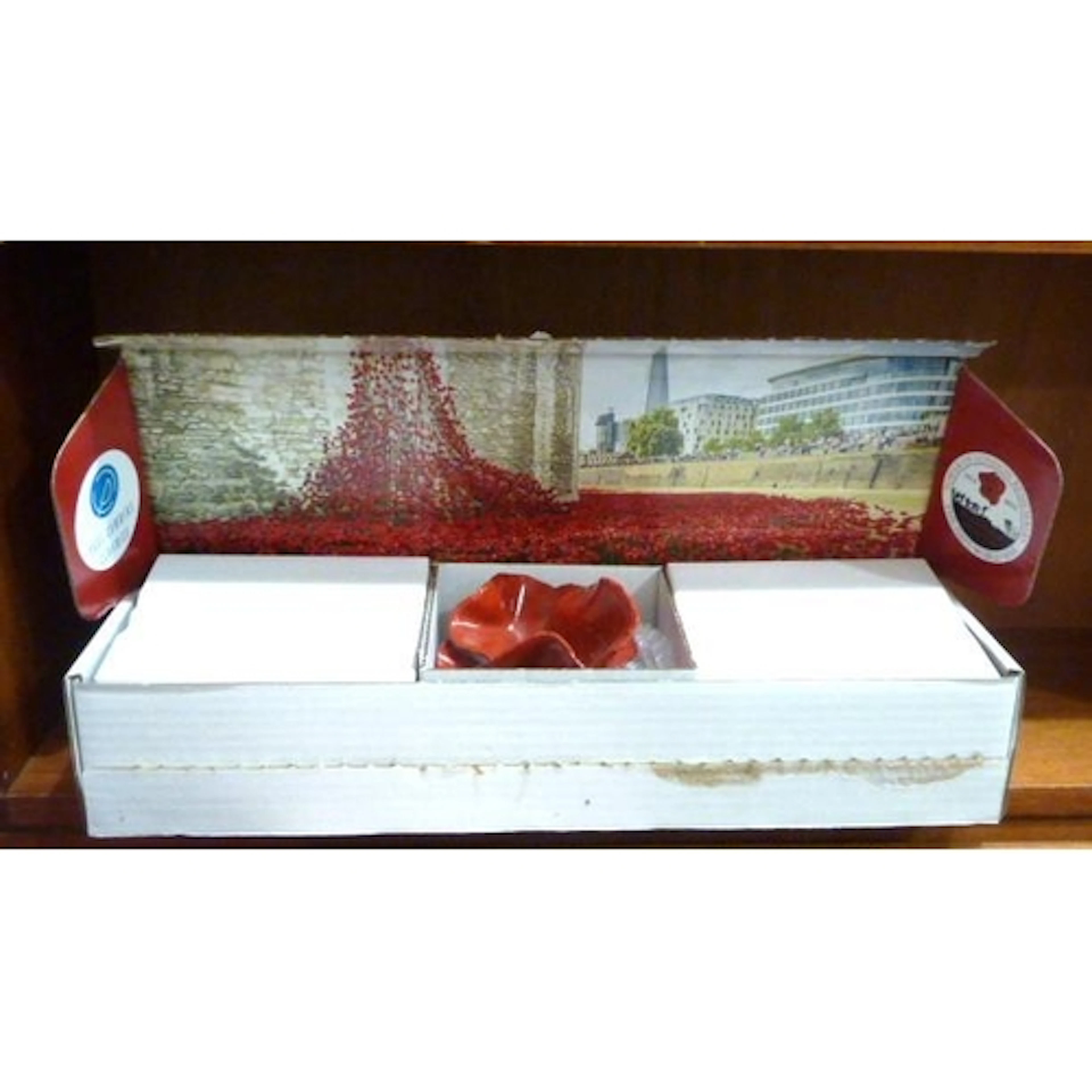 A Paul Cummins ceramic Tower of London commemorative poppy, ...