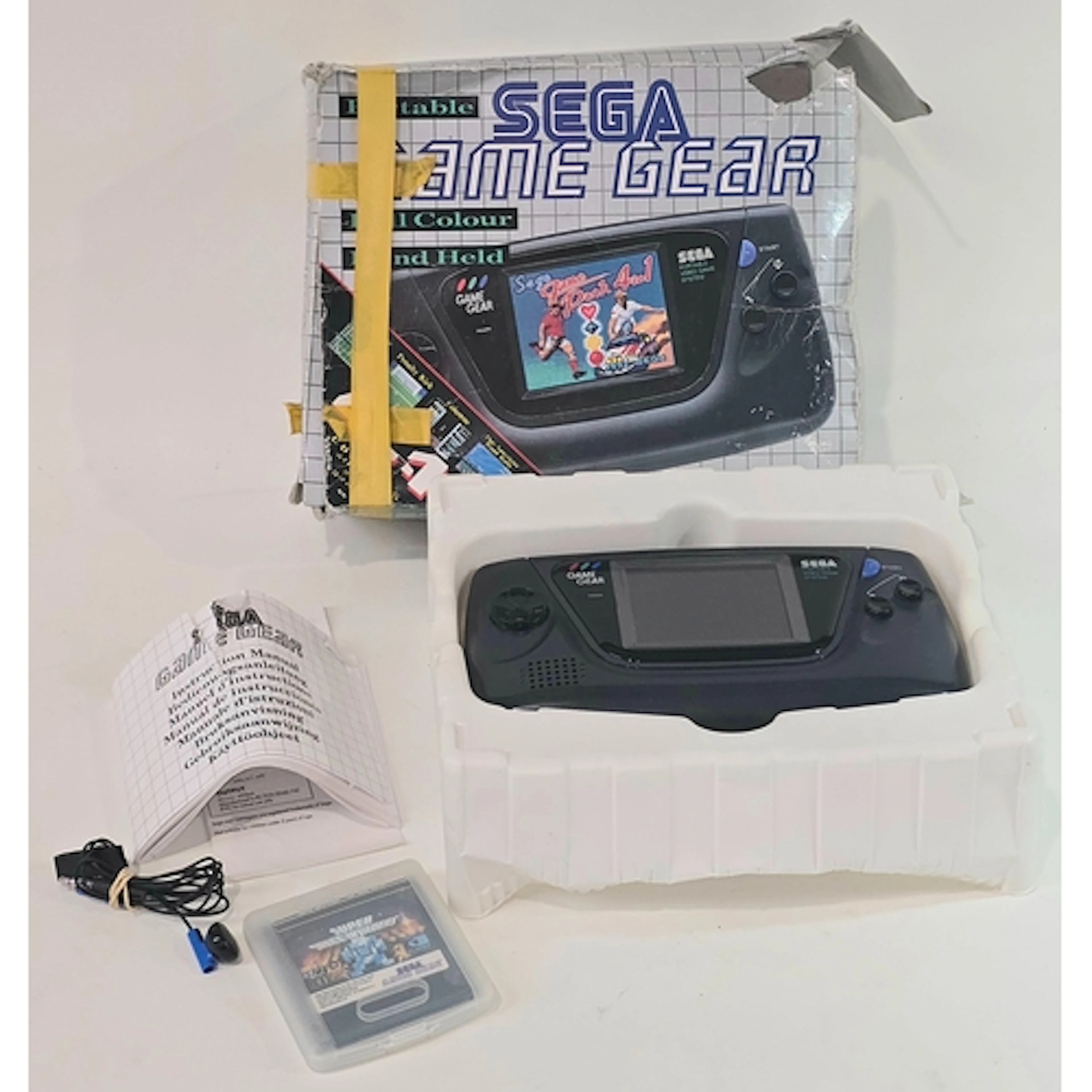 A vintage Portable Sega Game Gear console c/w original box, ...