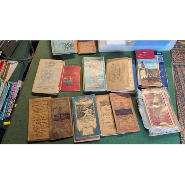 A collection of folding British road and Ordnance Survey map...
