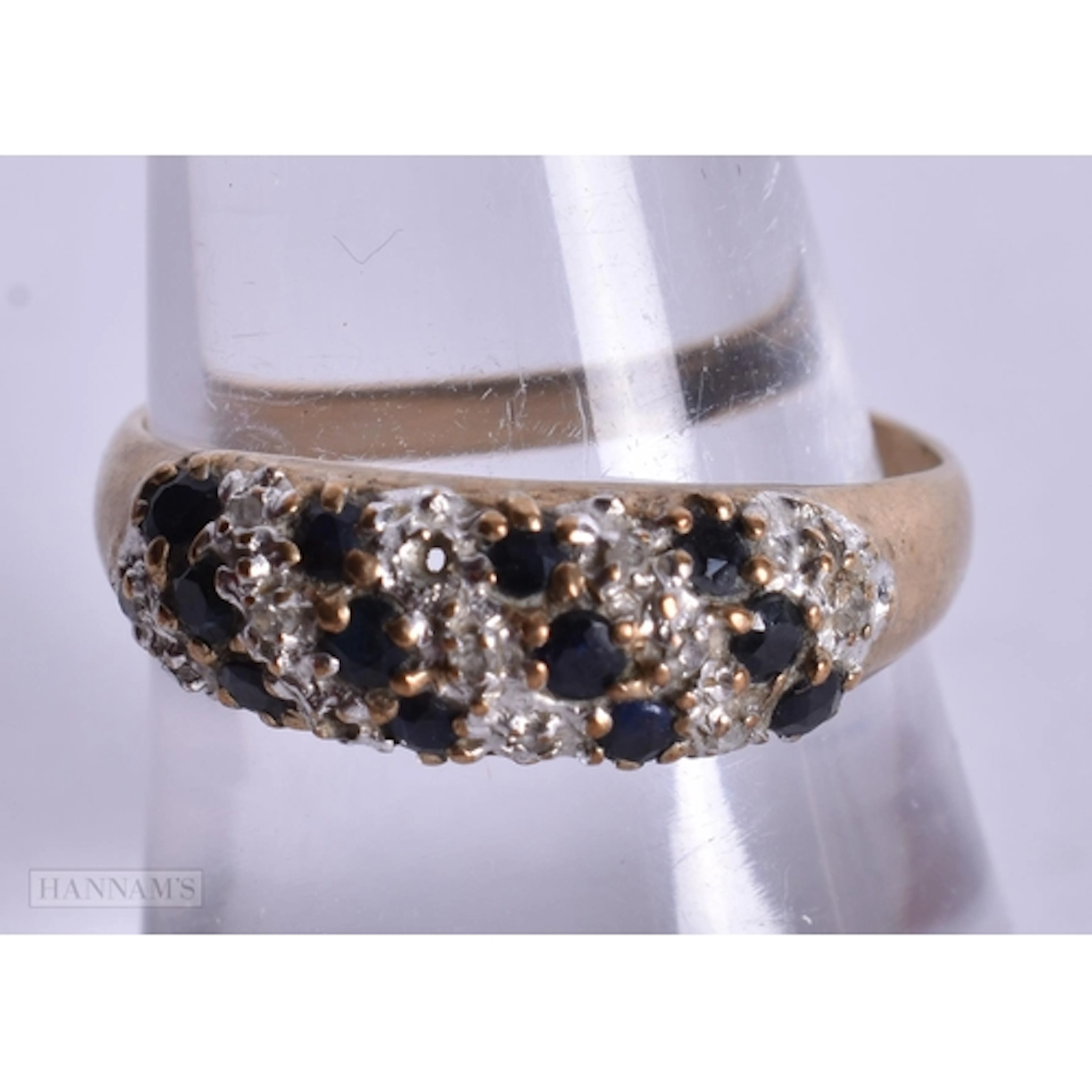 A 9CT GOLD SAPPHIRE AND DIAMOND RING. 2.1 grams. O.