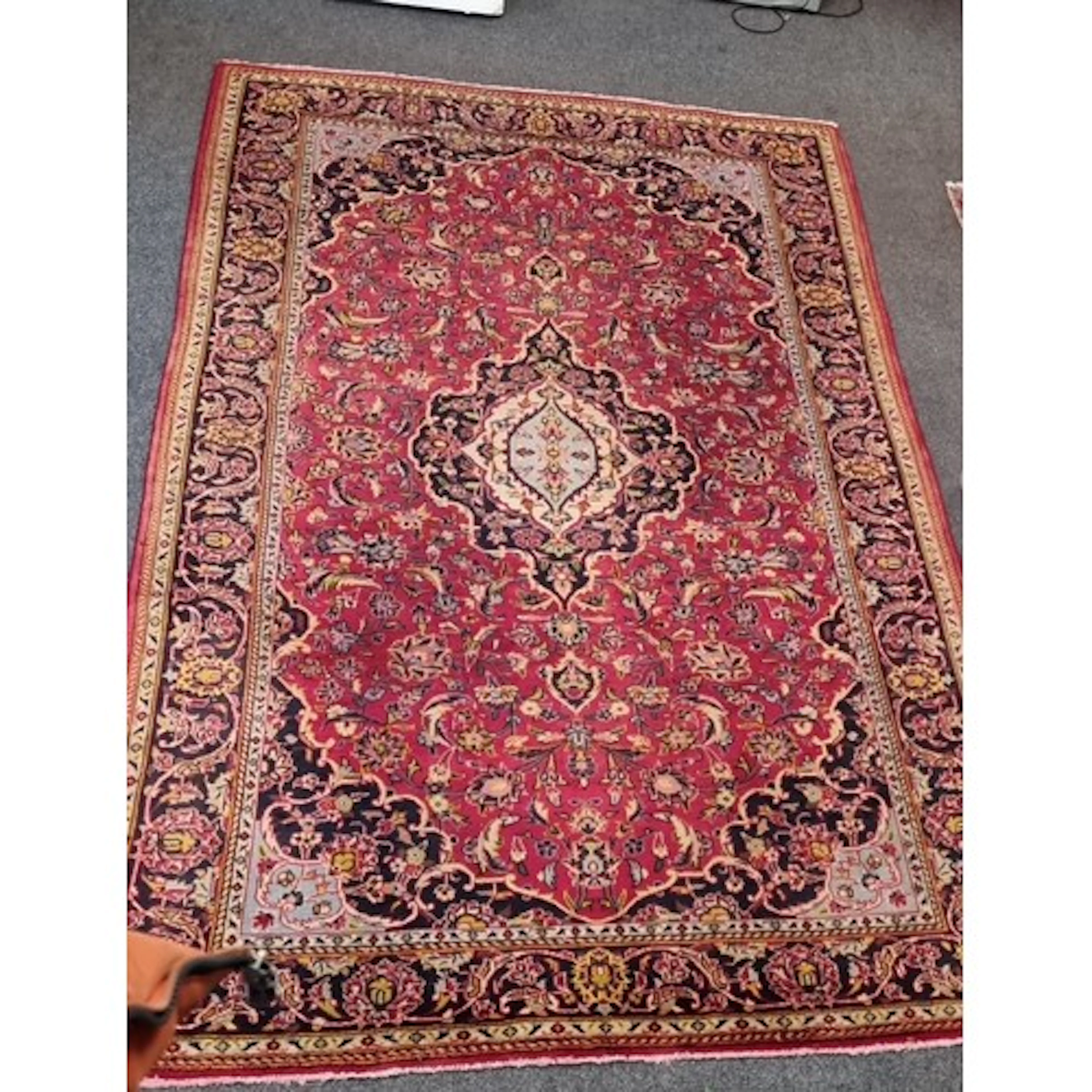 Fine handwoven rich Red ground Persian Mashad carpet traditi...