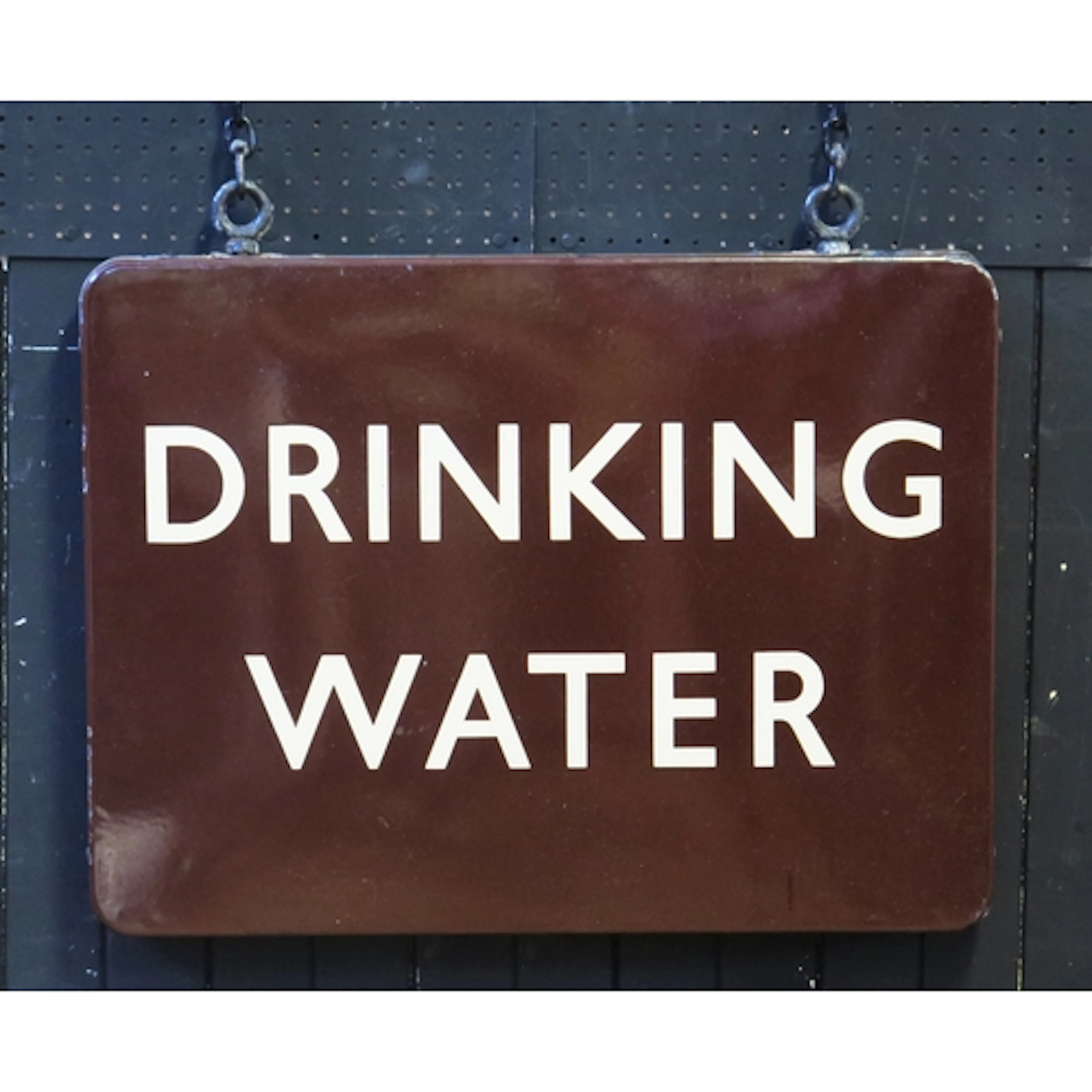 "Drinking Water" a double sided station sign with cream lett...