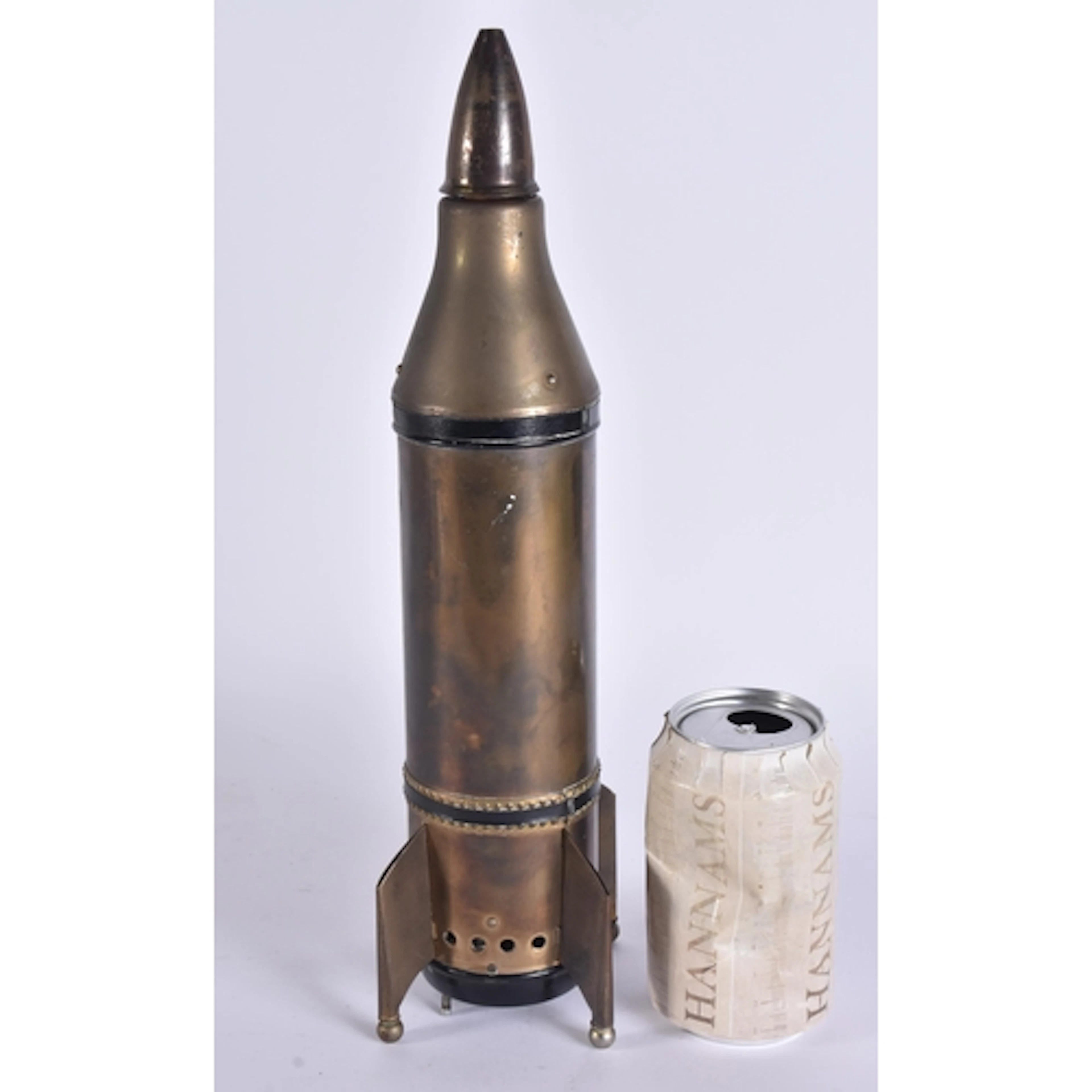 AN UNUSUAL VINTAGE MUSICAL ROCKET DECANTER. 34 cm high.