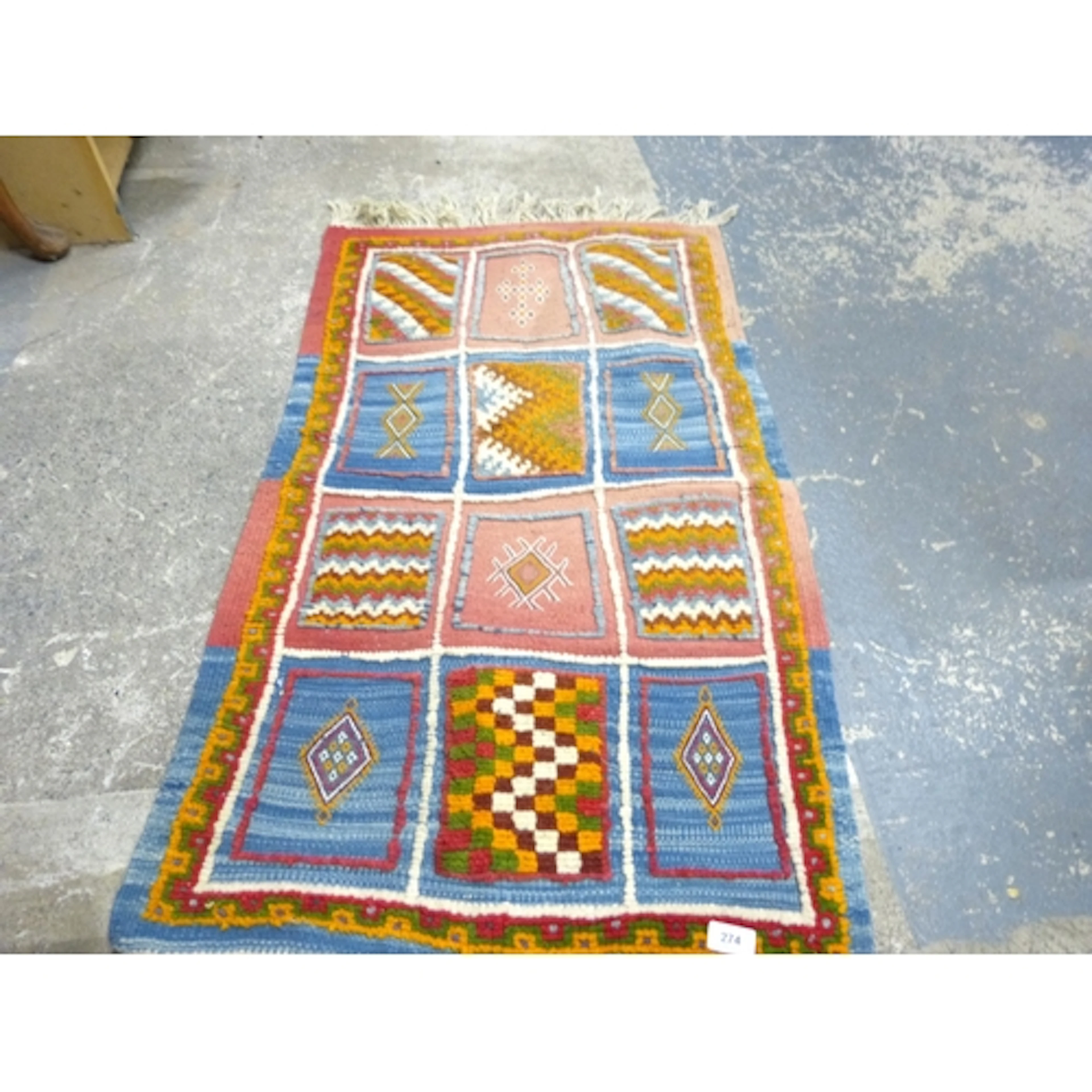 Small hand stitched vintage rug.