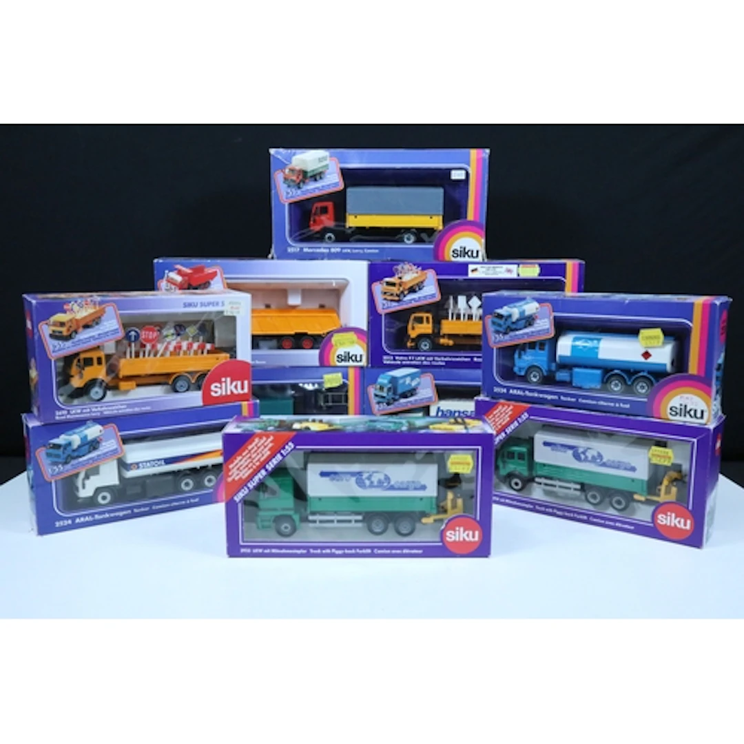 Ten boxed Siku haulage and commercial related diecast models...